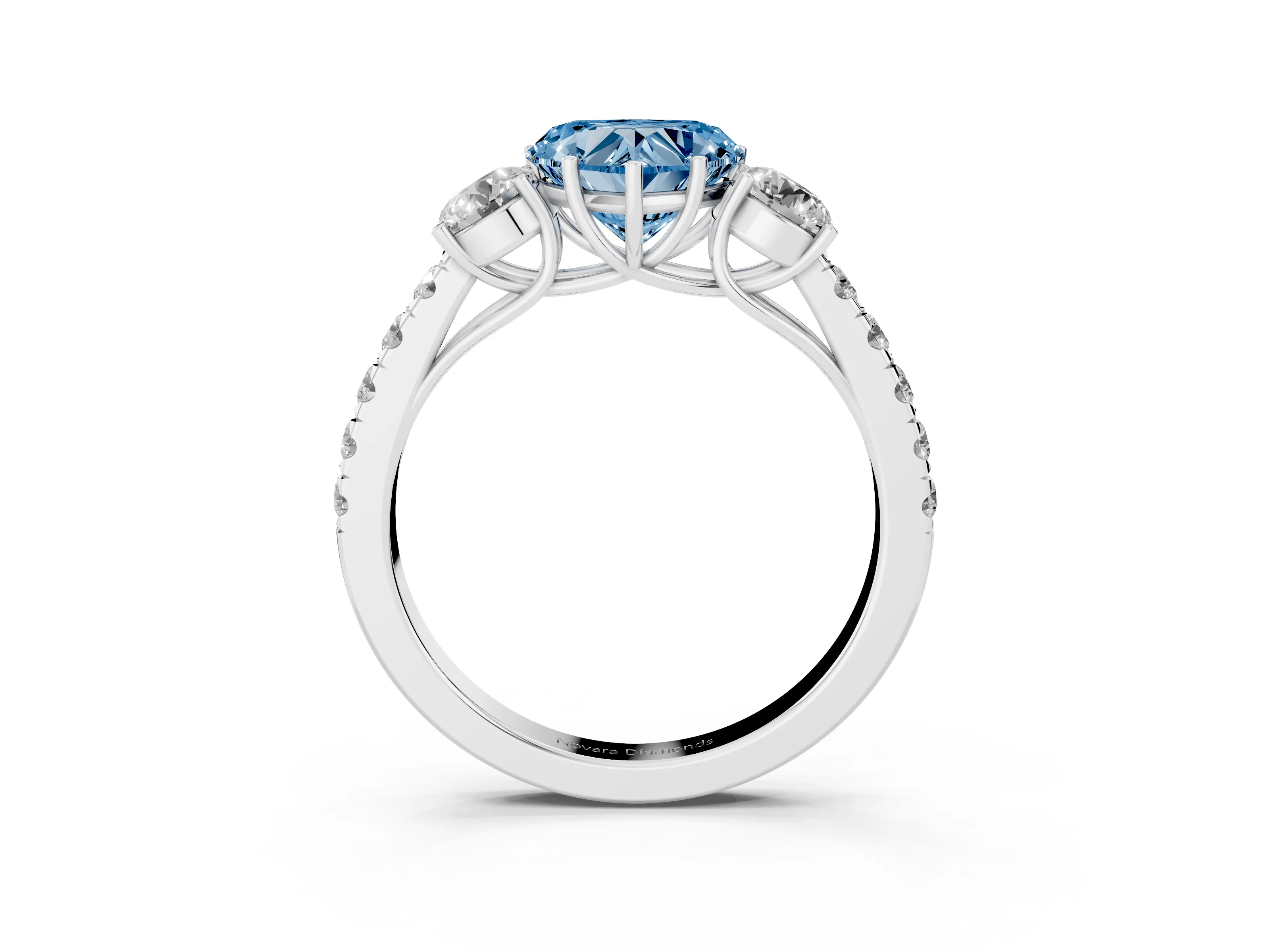 Fancy Blue Heart Cut Diamond Three-Stone Ring Set in White gold with Round Side Stones and Delicate Pavé Band