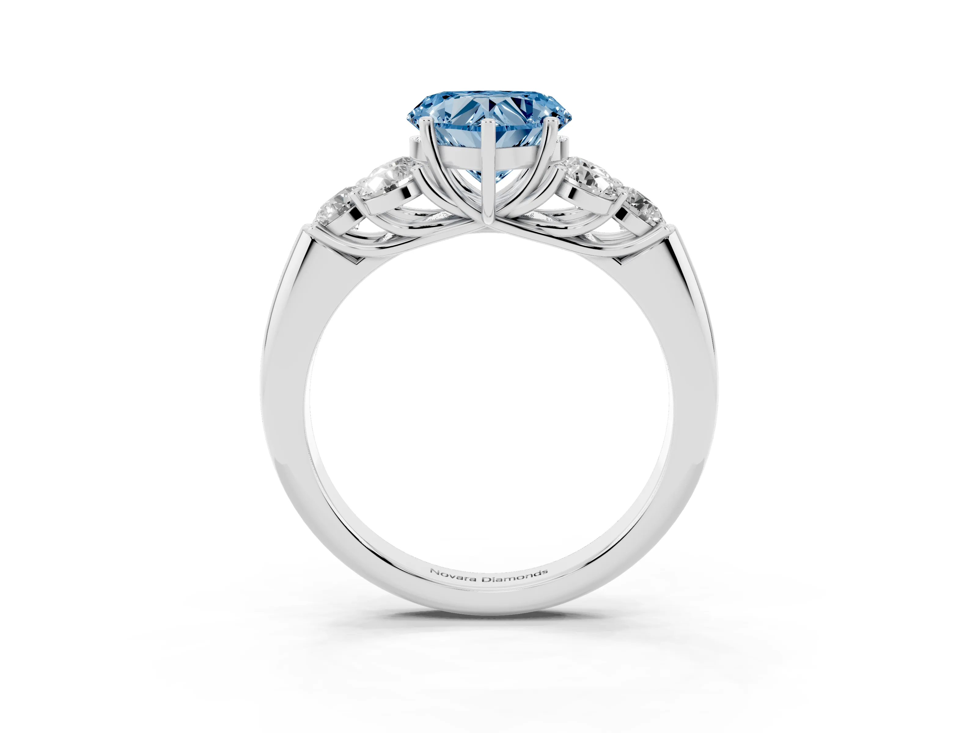 Fancy Blue Heart Cut Diamond Cluster Ring Set in Platinum with Round Accent Stones and Prong Setting on a Plain Band