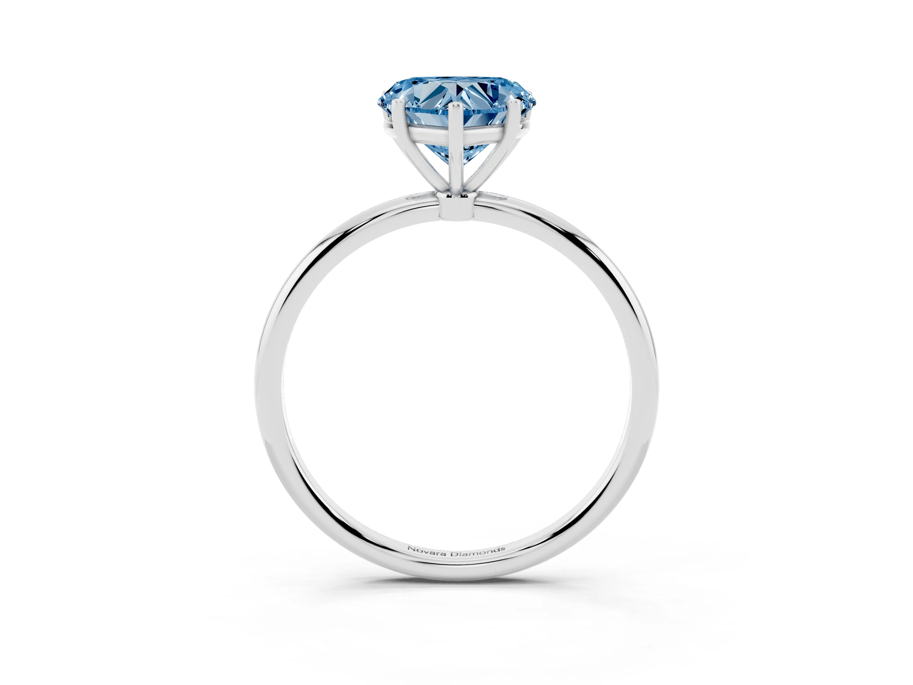 Fancy Blue Heart Cut Diamond Solitaire Engagement Ring Set in Platinum with Thin Band and Prong Setting