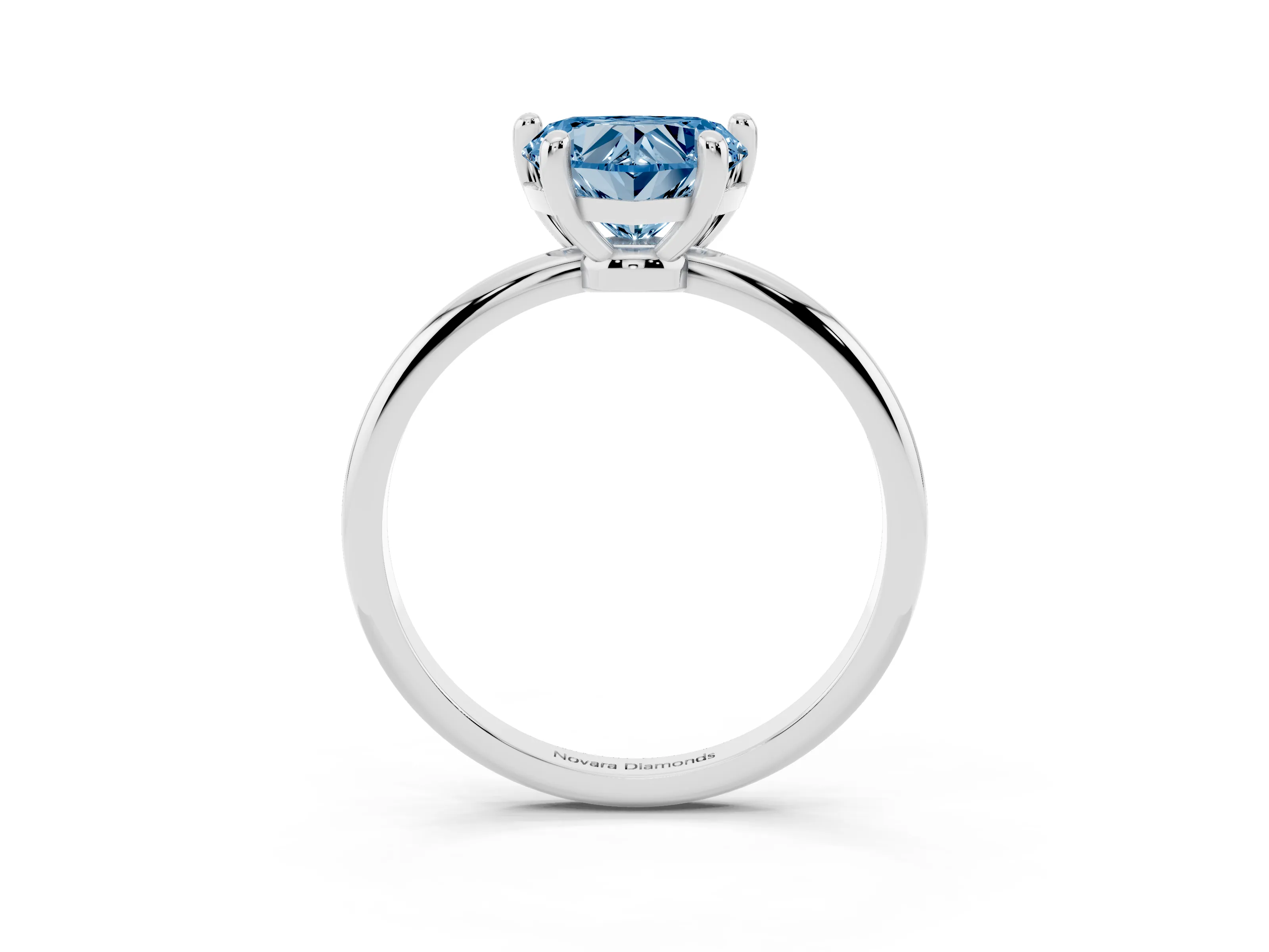 Fancy Blue Heart Cut Diamond Solitaire Ring Set in Platinum with Secure Prong Setting on a Classic Band