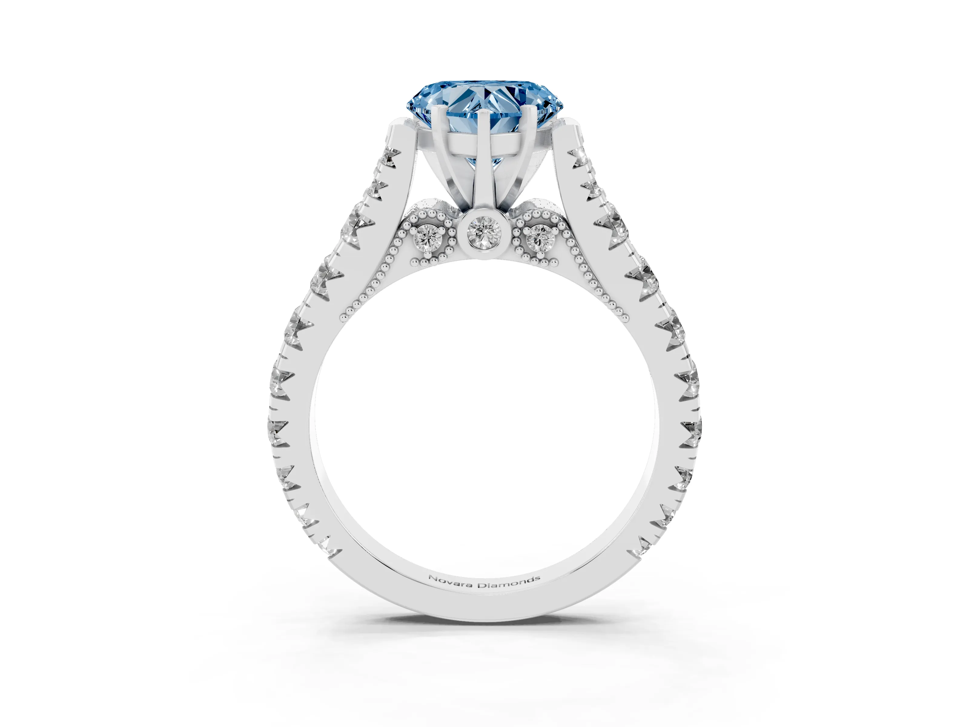 Fancy Blue Heart Cut Diamond Classic Solitaire Ring Set in White gold with Pavé Band and Prong Setting