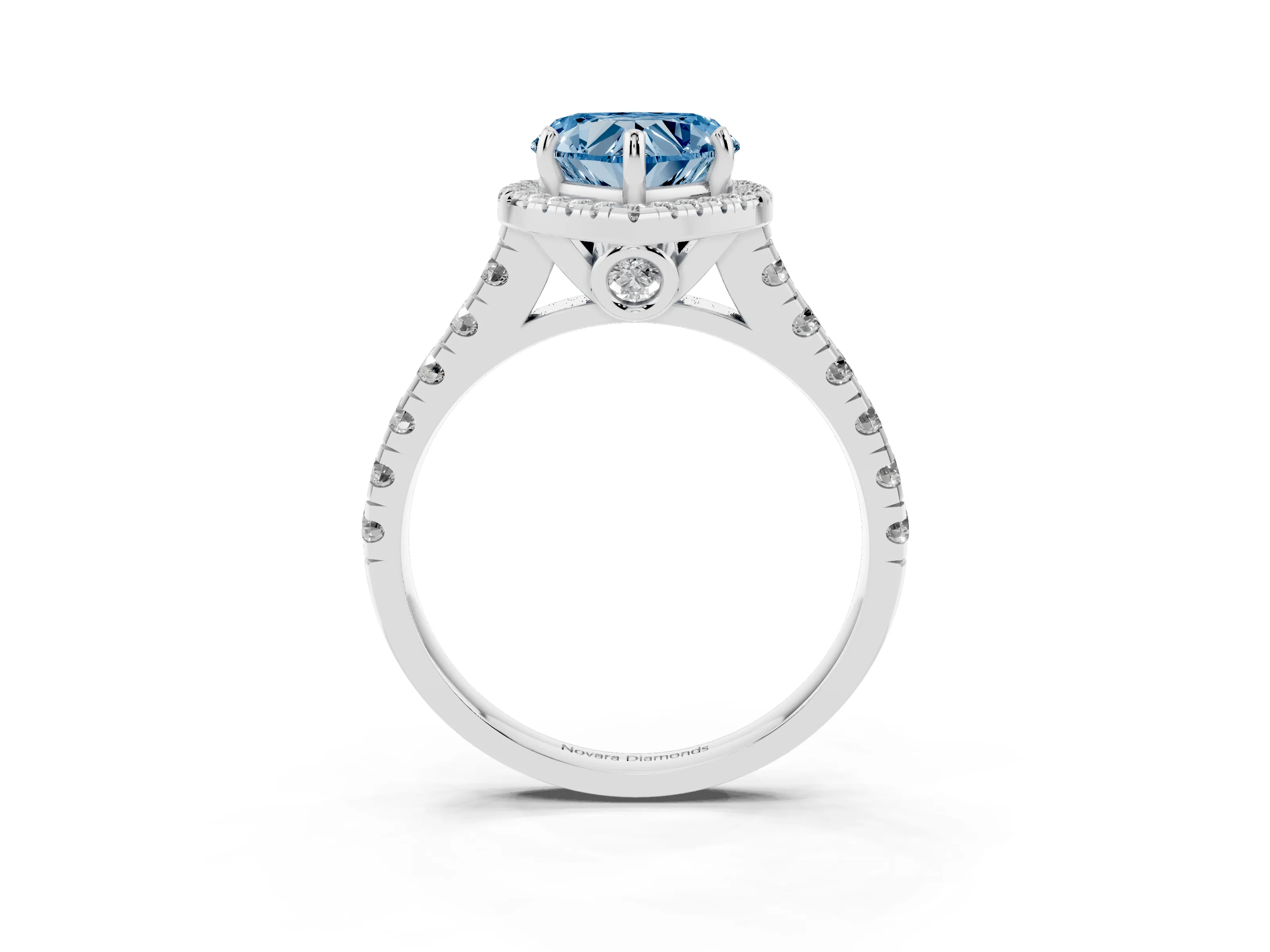Fancy Blue Heart Cut Diamond Halo Engagement Ring Set in White gold with Pavé Band and Prong-Set Center