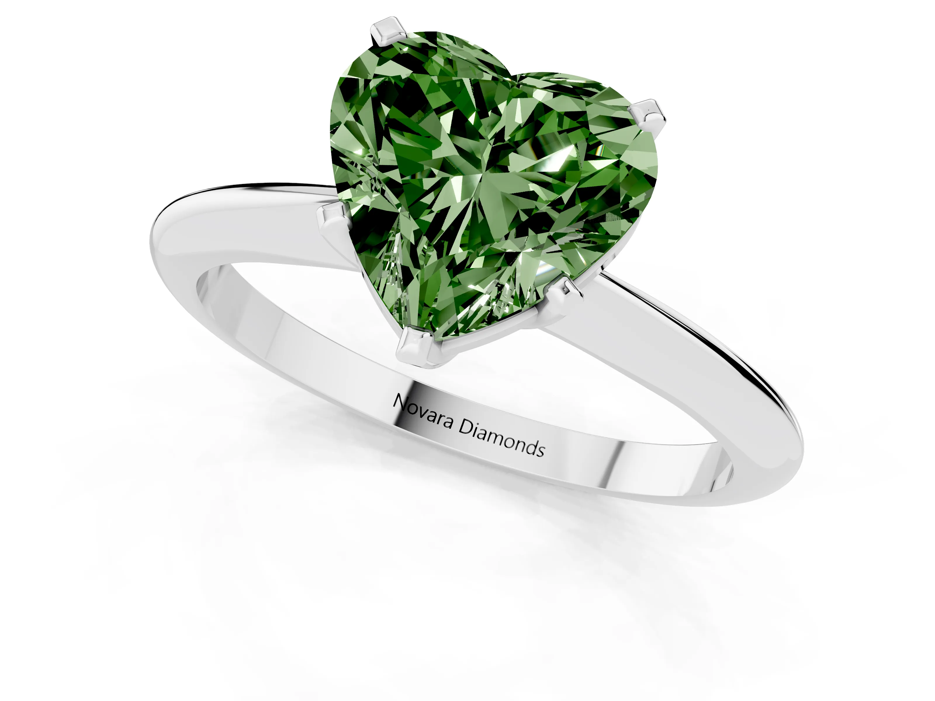 Fancy Green Heart Cut Diamond Solitaire Ring Set in Silver with Prong Setting on a Plain Round Band