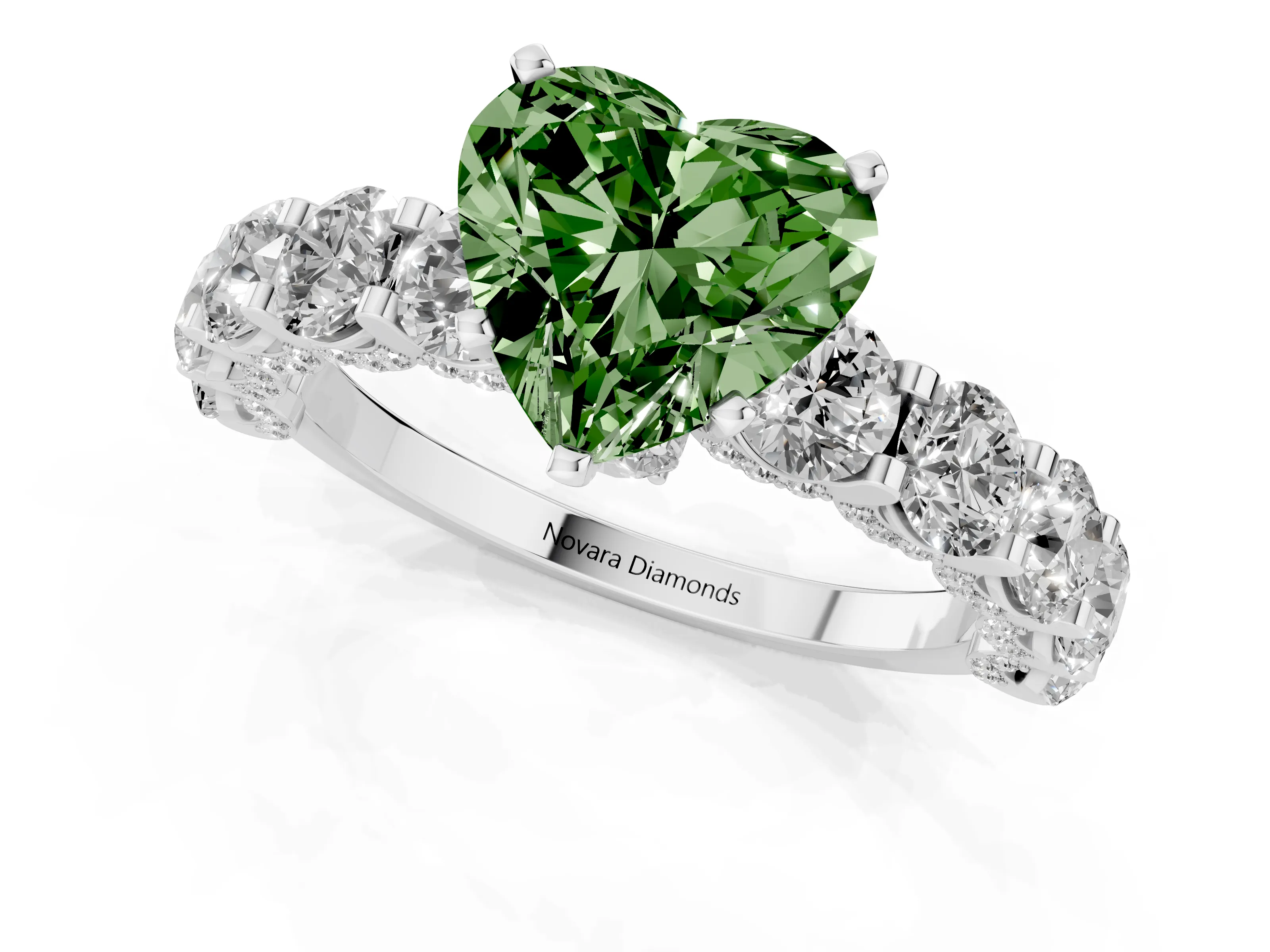 Fancy Green Heart Cut Diamond Side Stone Ring Set in White gold with Alternating Round and Oval Side Stones