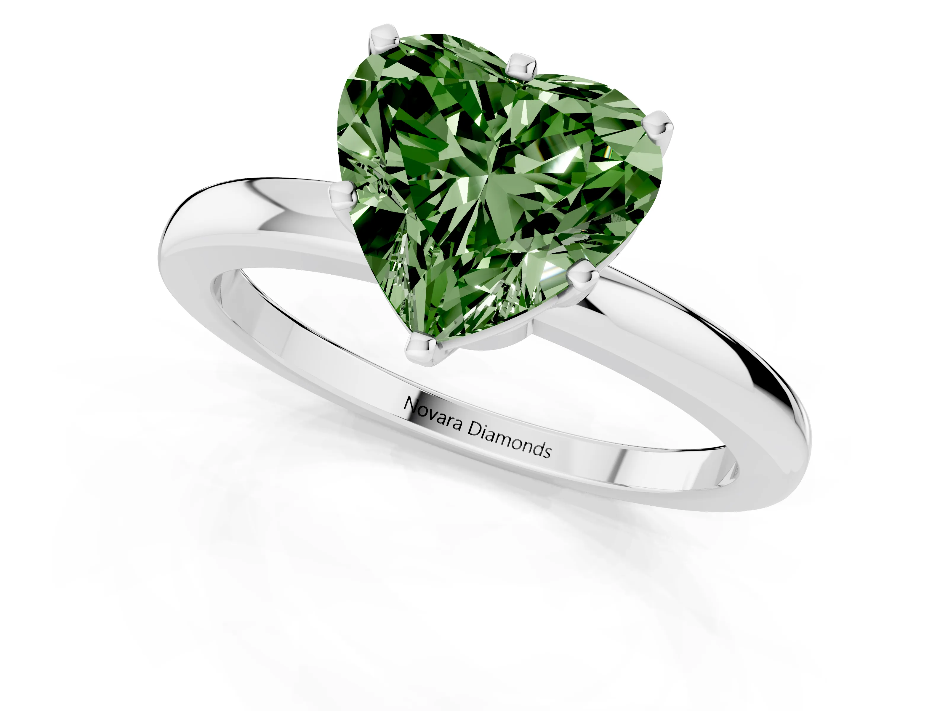 Fancy Green Heart Cut Diamond Solitaire Ring Set in White gold with Raised Prong Setting on a Classic Band