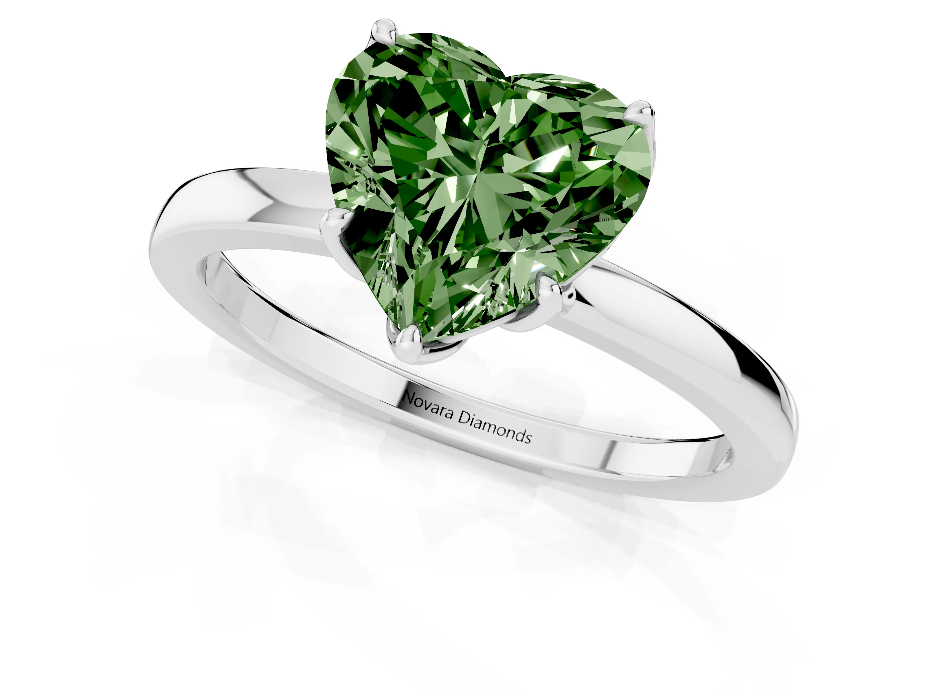 Fancy Green Heart Cut Diamond Solitaire Ring Set in White gold with Prong Setting and Thin Polished Band