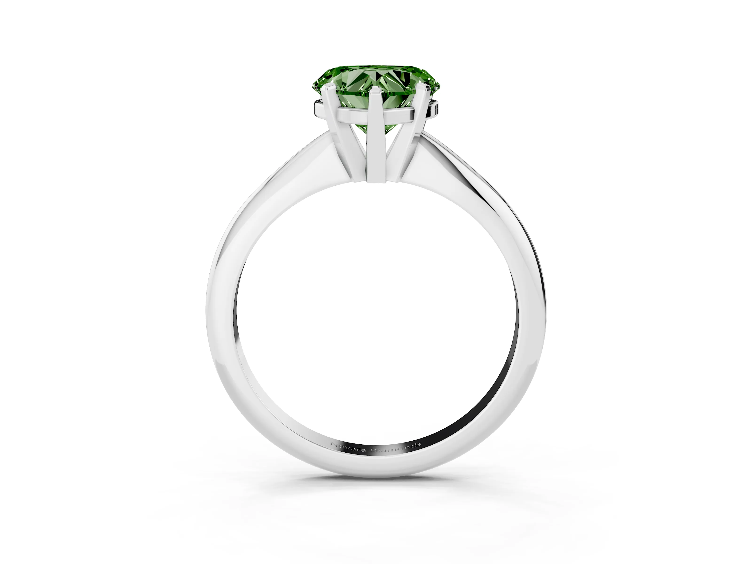 Fancy Green Heart Cut Diamond Solitaire Ring Set in Silver with Prong Setting on a Plain Round Band