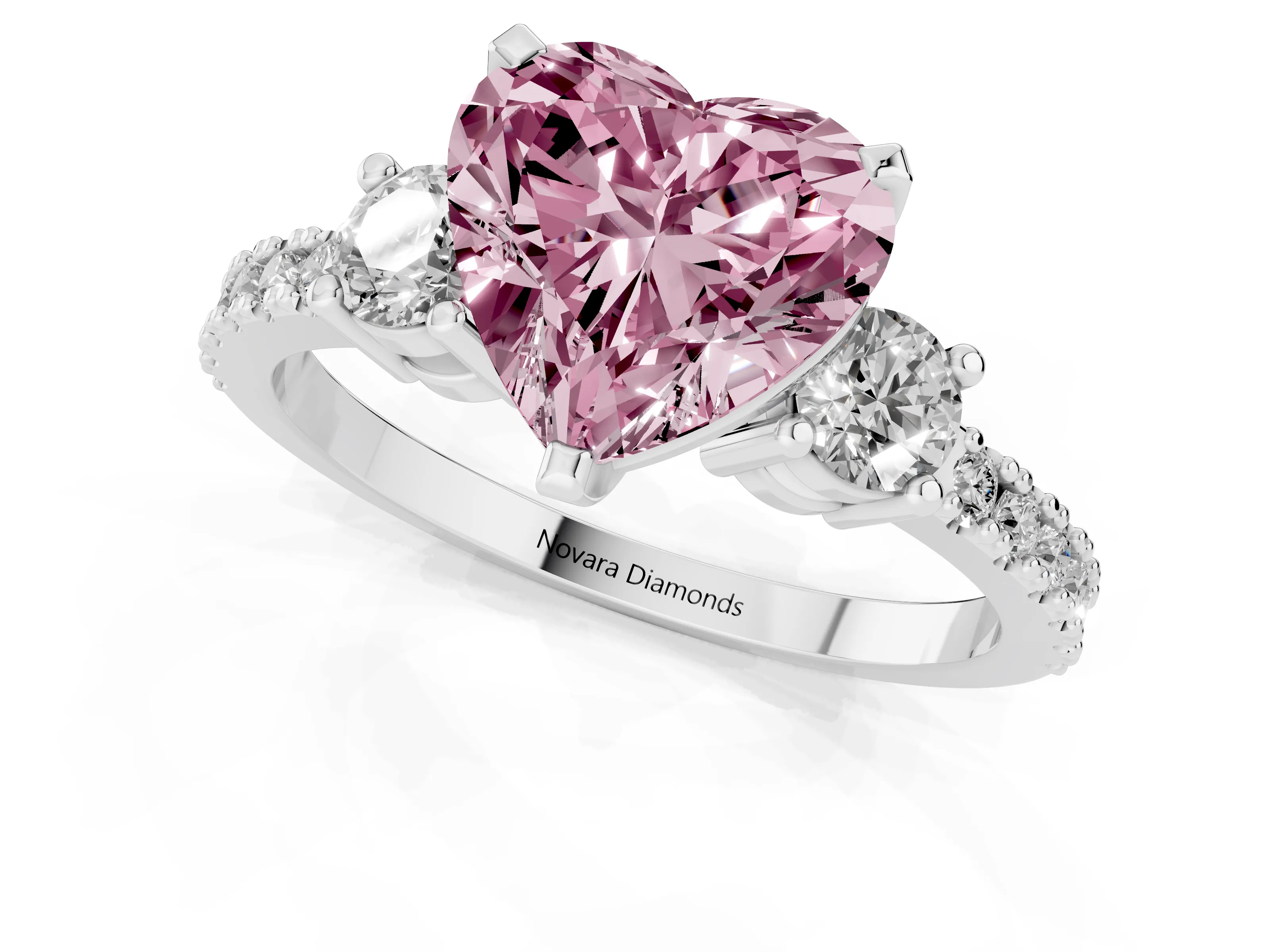 Fancy Pink Three-Stone Heart Cut Diamond Pavé Band Ring Set in White gold with Prong Setting