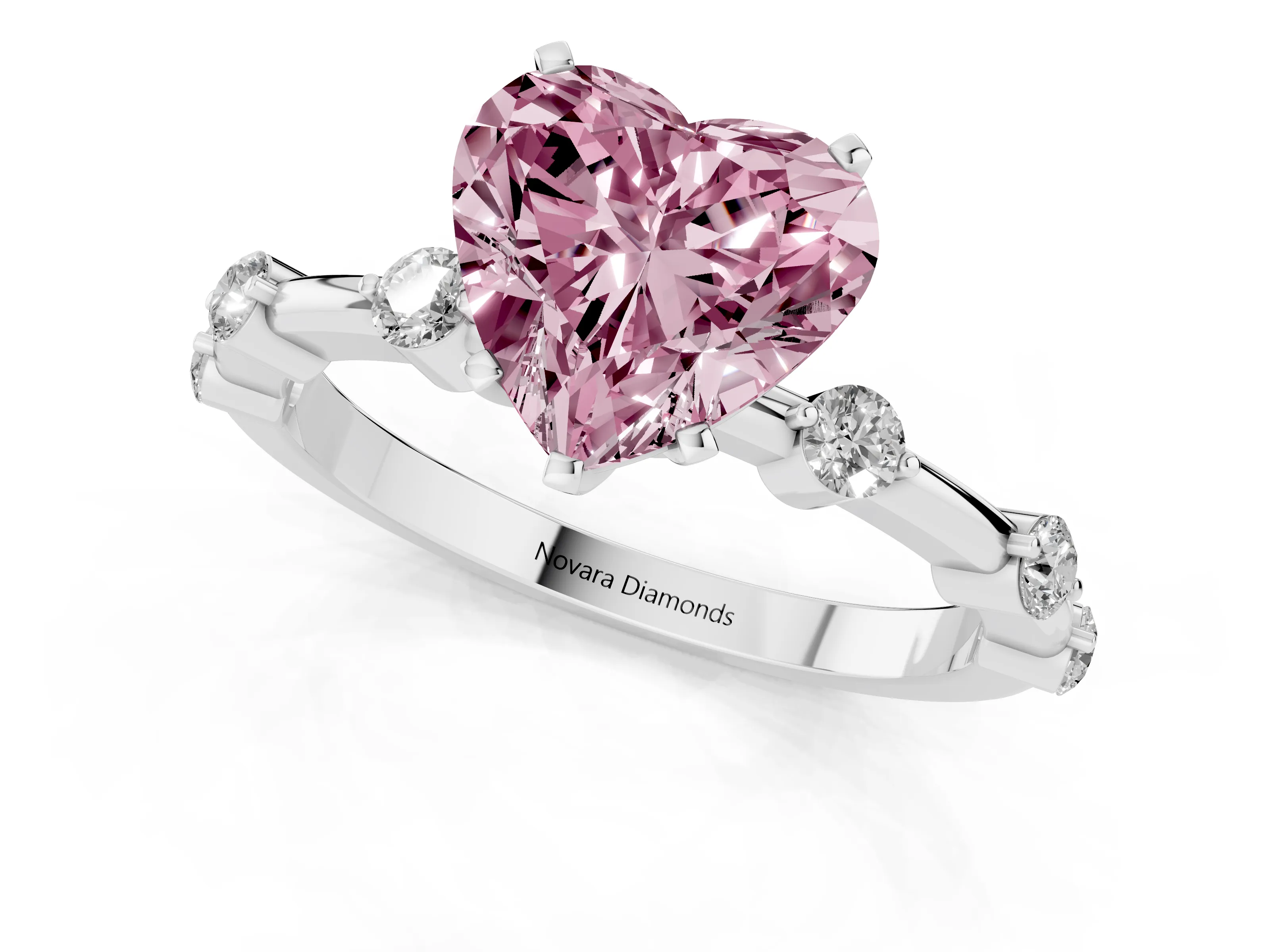 Fancy Pink Heart Cut Diamond Solitaire Ring Set in White gold with Bezel Set Side Stones and Prong Setting