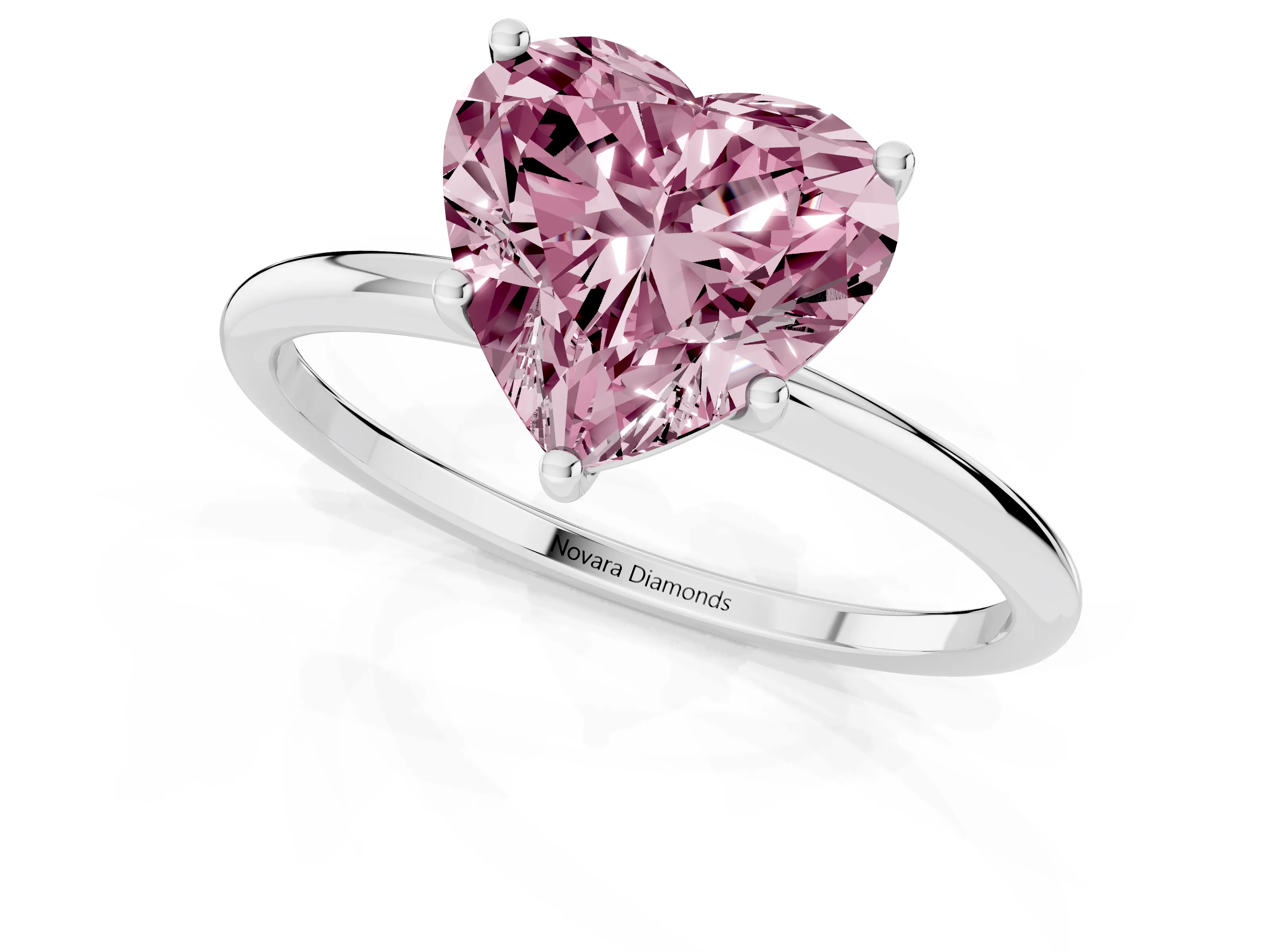 Fancy Pink Heart Cut Diamond Solitaire Engagement Ring Set in Platinum with Thin Band and Prong Setting