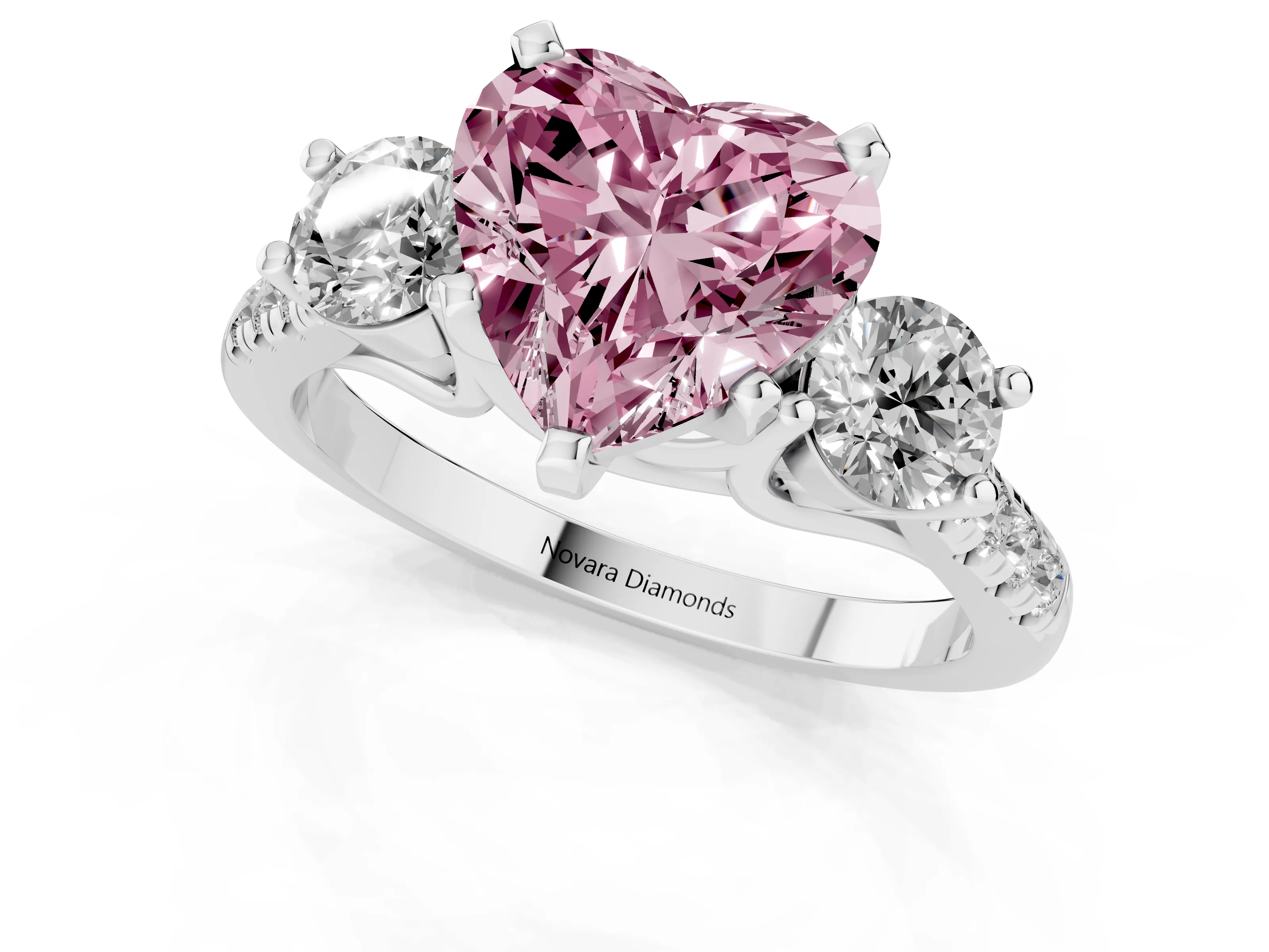 Fancy Pink Three-Stone Heart Cut Diamond Pavé Band Ring Set in Platinum with Prong-Set Trio
