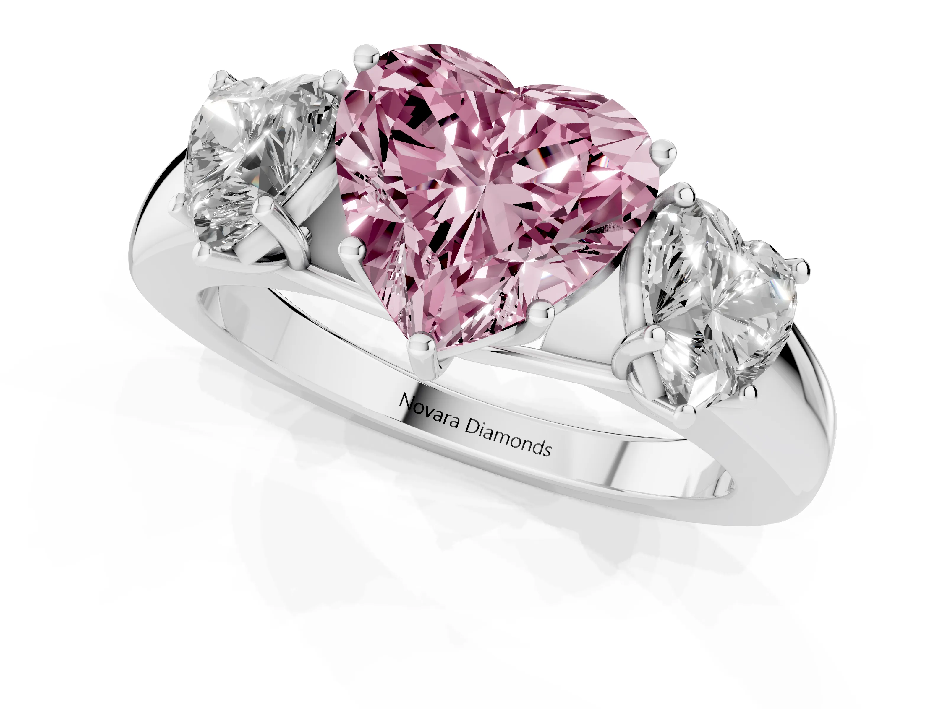 Fancy Pink Three-Stone Heart Cut Diamond Ring Set in Silver with Matching Prong Settings and Plain Band