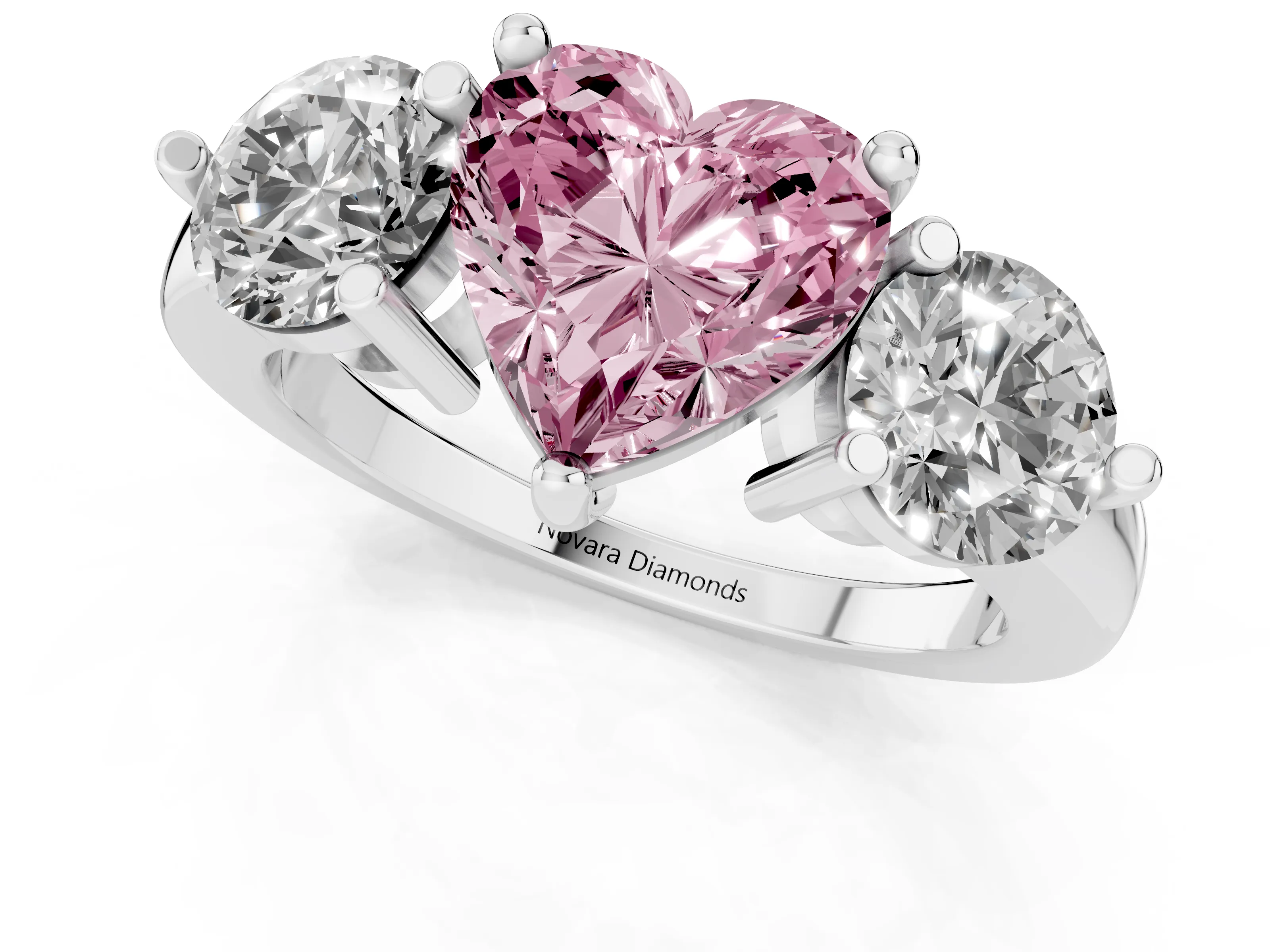 Fancy Pink Heart Cut Diamond Three-Stone Ring Set in White gold with Prong Setting and Classic Band