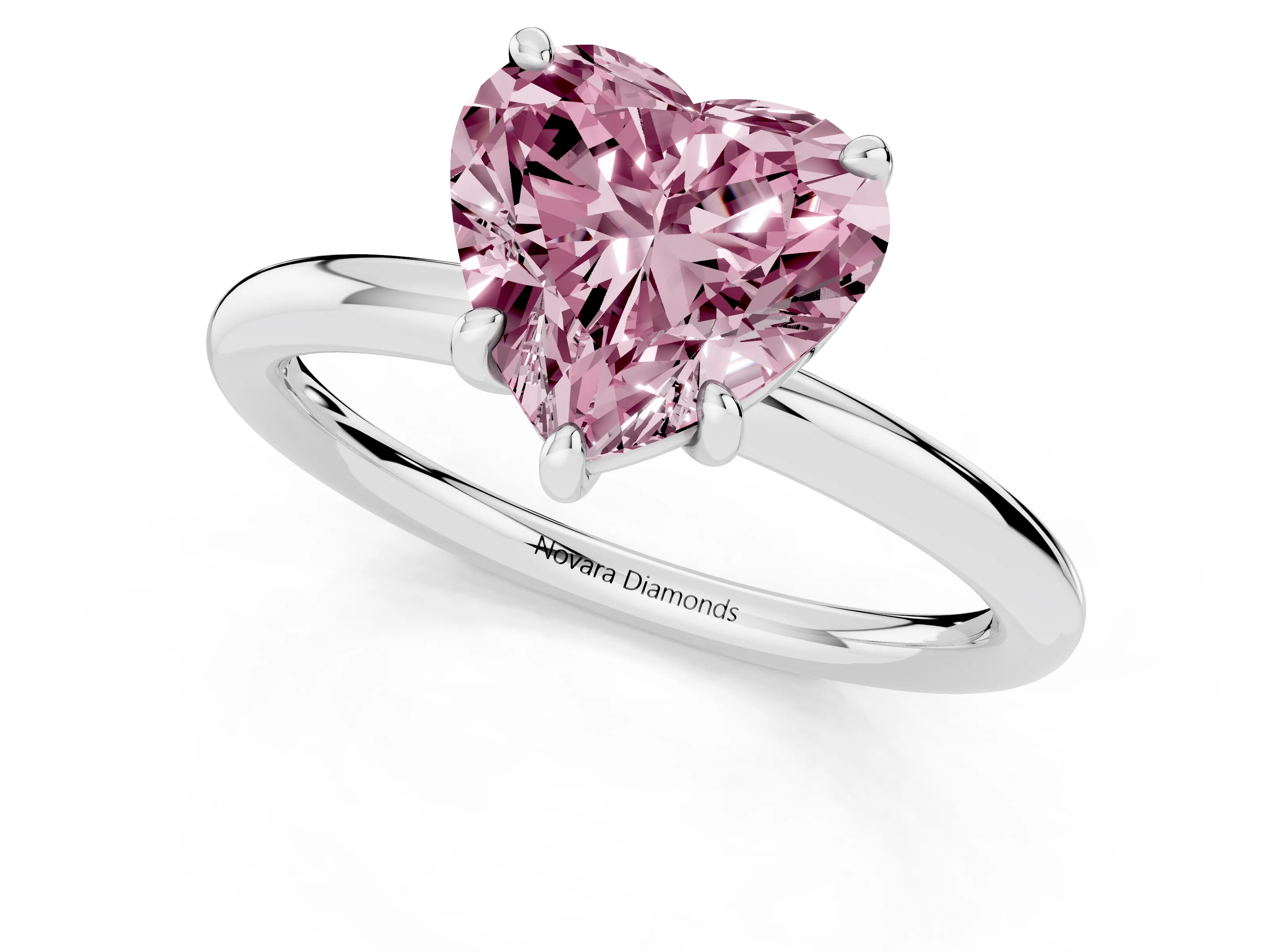 Fancy Pink Heart Cut Diamond Solitaire Ring Set in Platinum with Prong Setting on a Polished Plain Band