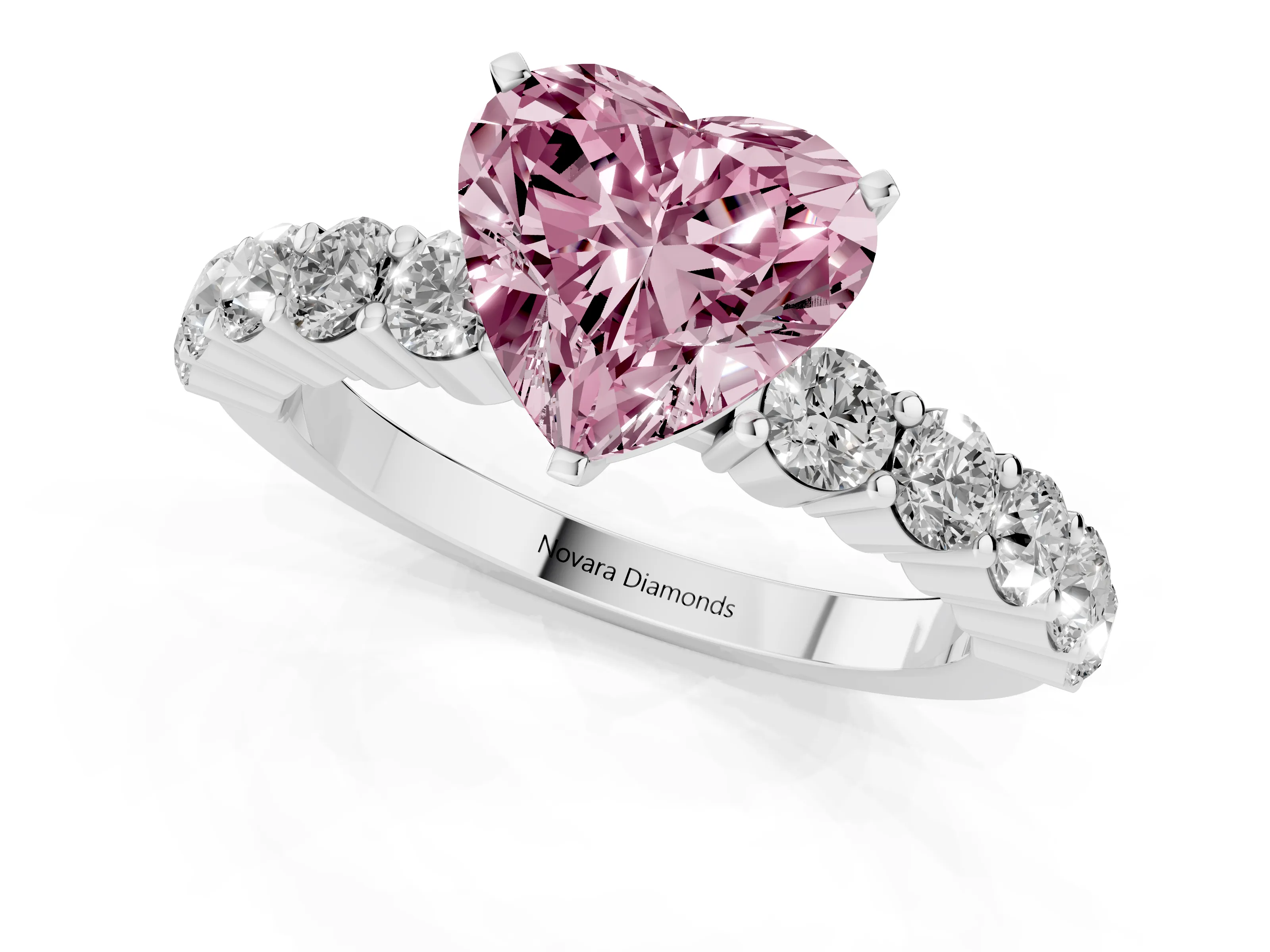 Fancy Pink Heart Cut Diamond Solitaire Ring Set in White gold with Shared Prong Round Side Stones