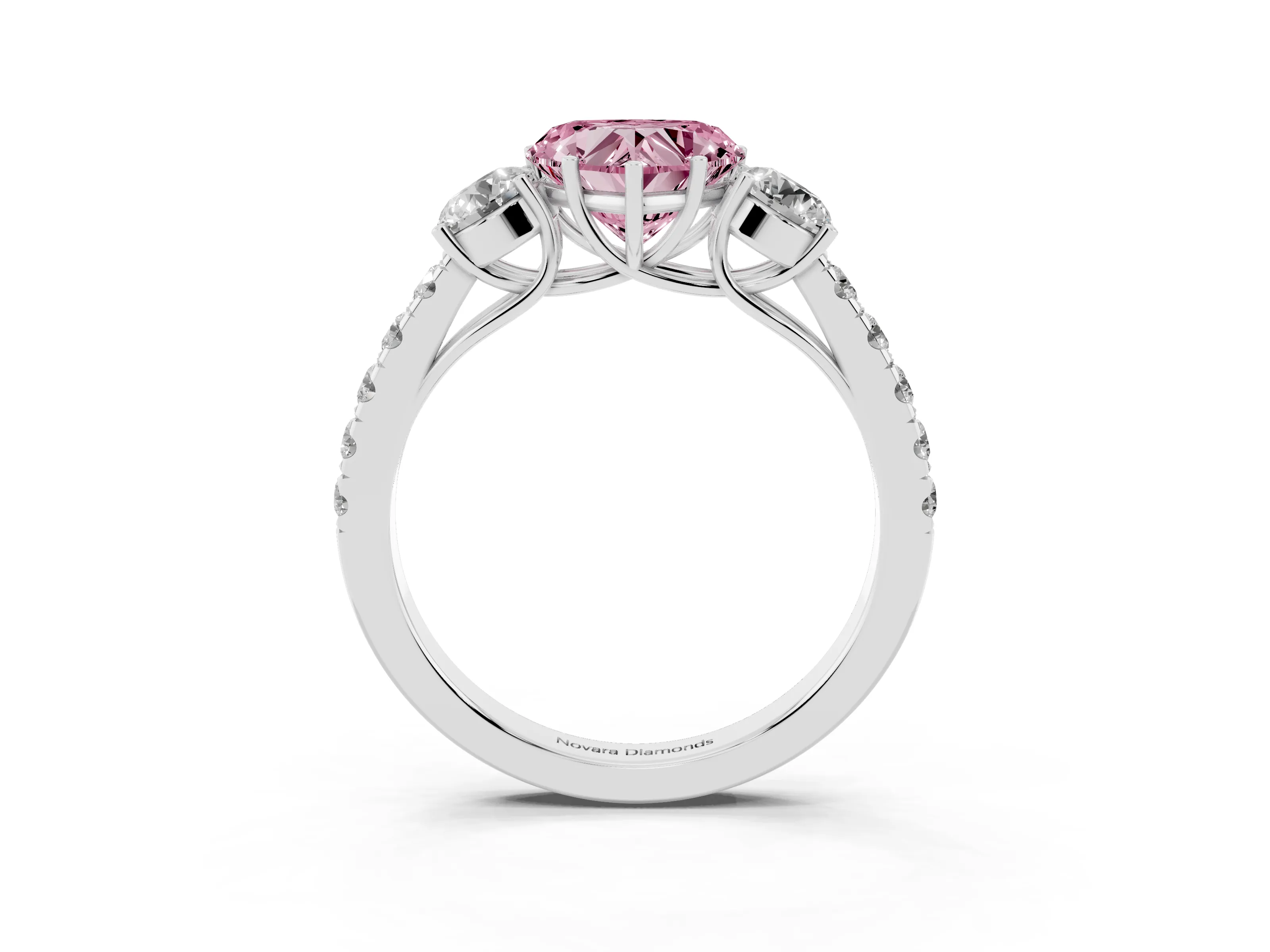 Fancy Pink Heart Cut Diamond Three-Stone Ring Set in White gold with Round Side Stones and Delicate Pavé Band