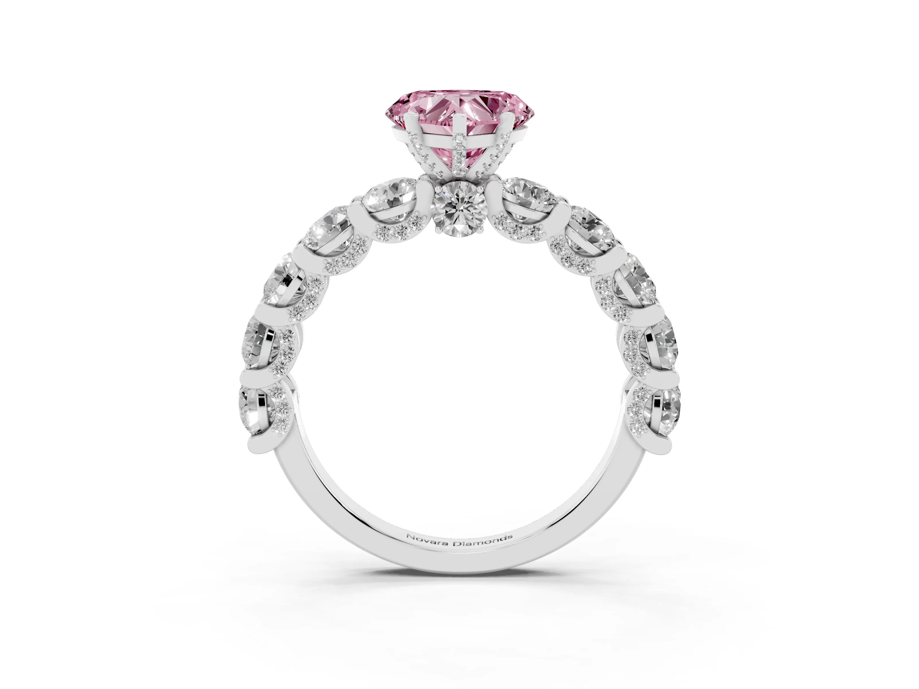 Fancy Pink Heart Cut Diamond Side Stone Ring Set in White gold with Alternating Round and Oval Side Stones