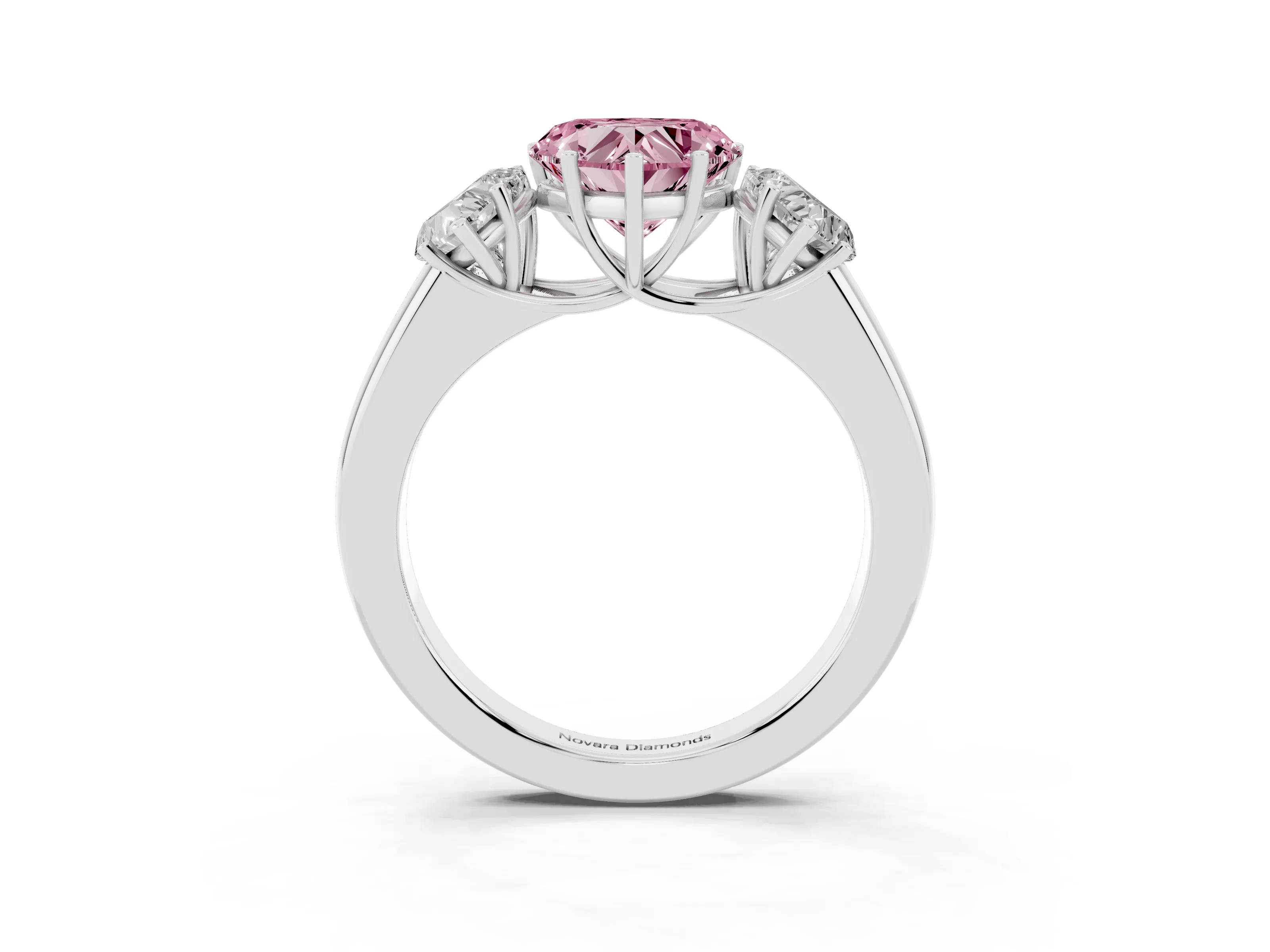 Fancy Pink Three-Stone Heart Cut Diamond Ring Set in Silver with Matching Prong Settings and Plain Band