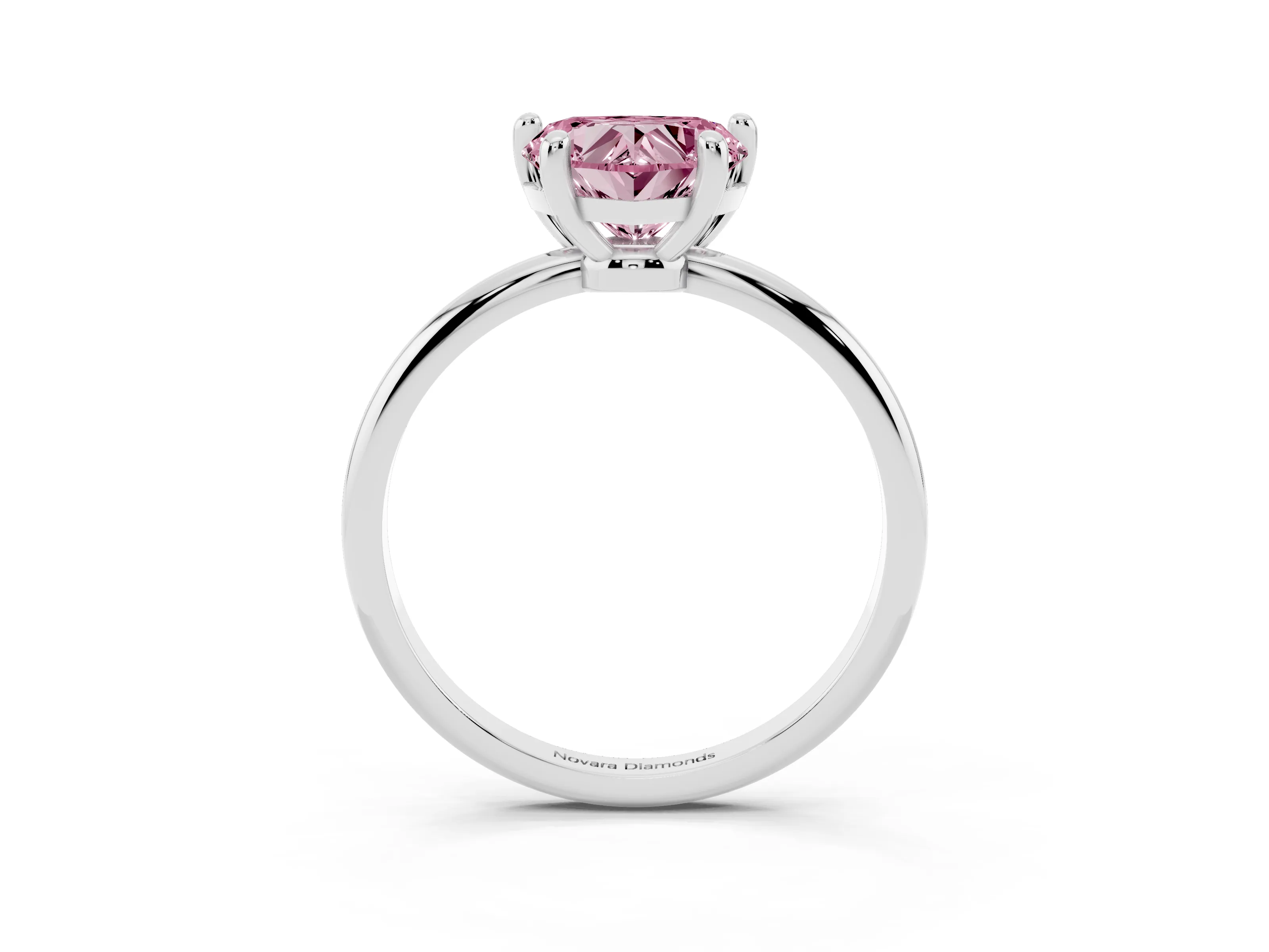 Fancy Pink Heart Cut Diamond Solitaire Ring Set in Platinum with Secure Prong Setting on a Classic Band