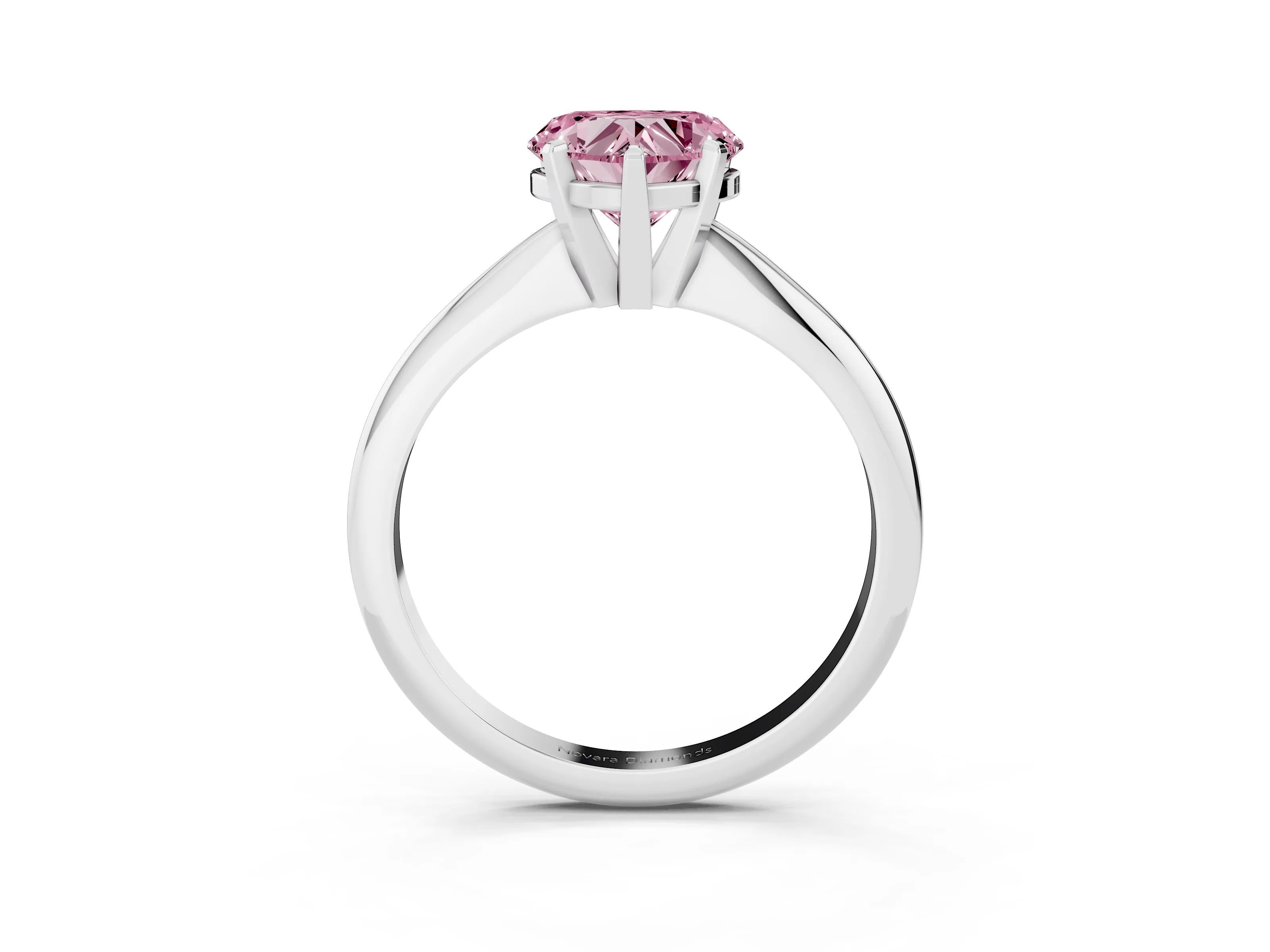 Fancy Pink Heart Cut Diamond Solitaire Ring Set in Silver with Prong Setting on a Plain Round Band