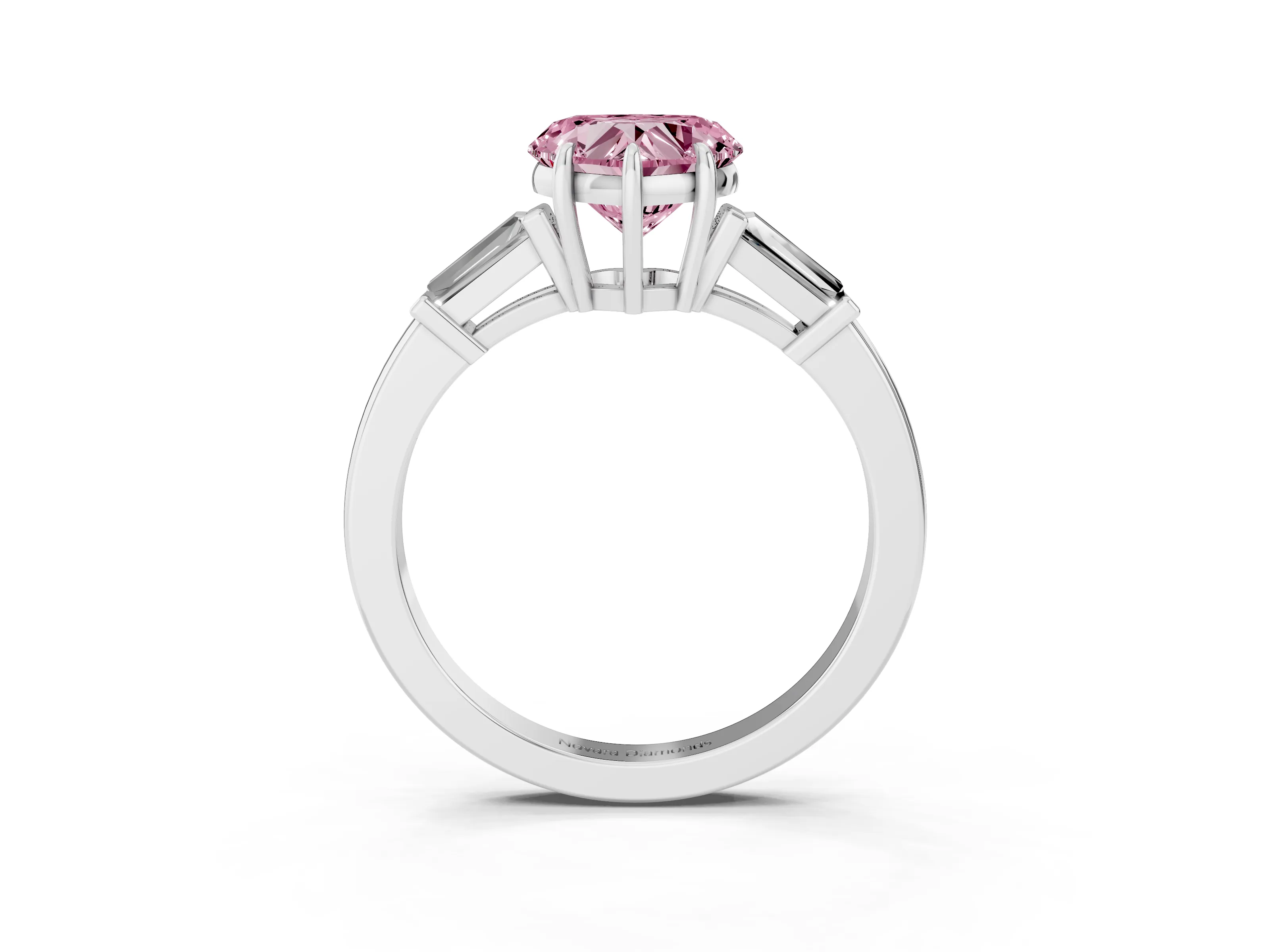 Fancy Pink Heart Cut Diamond Three-Stone Ring Set in Platinum with Tapered Baguette Side Stones and Prong Setting