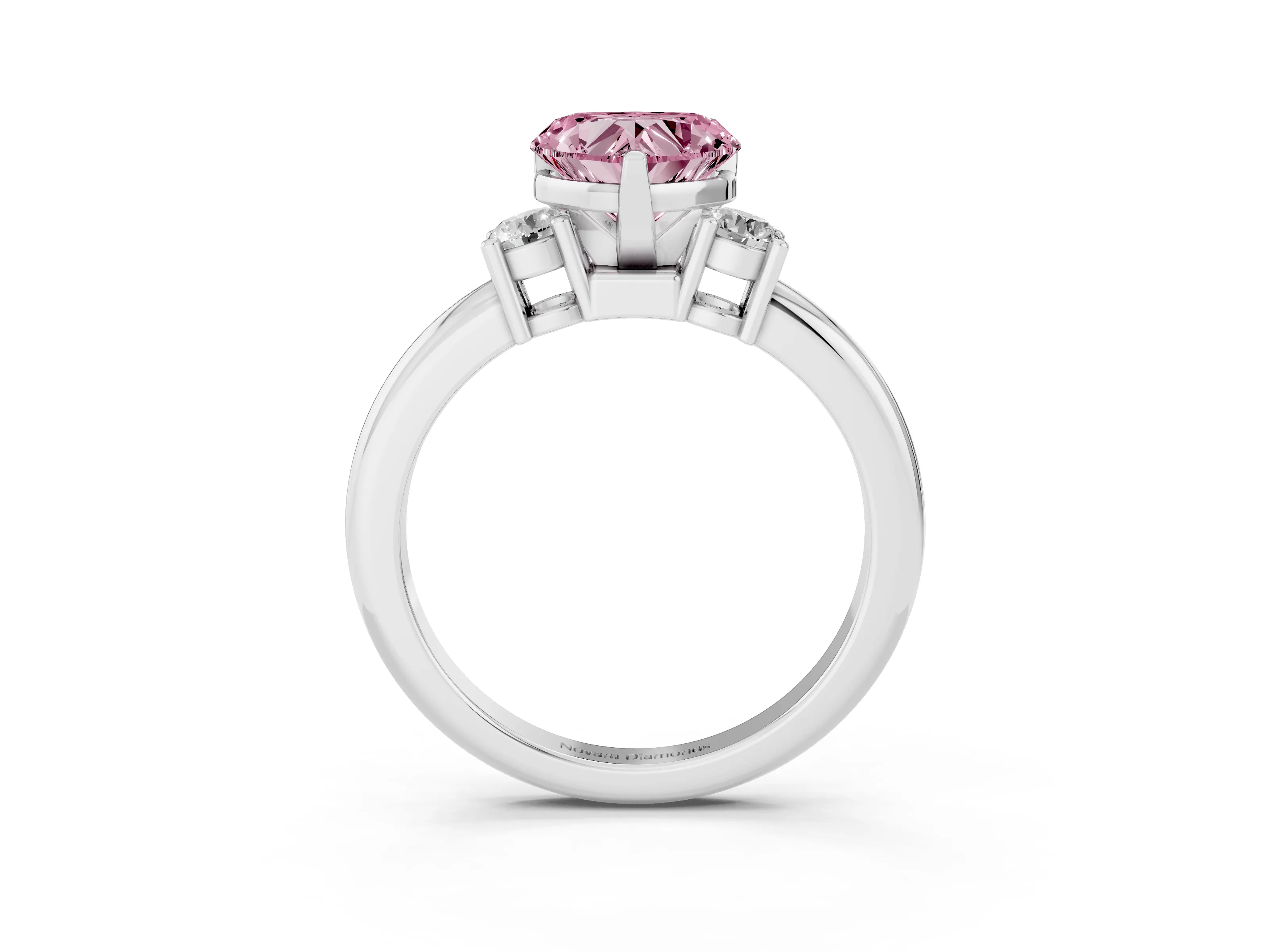 Fancy Pink Three-Stone Heart Cut Diamond Ring Set in Platinum with Prong Setting and Plain Band