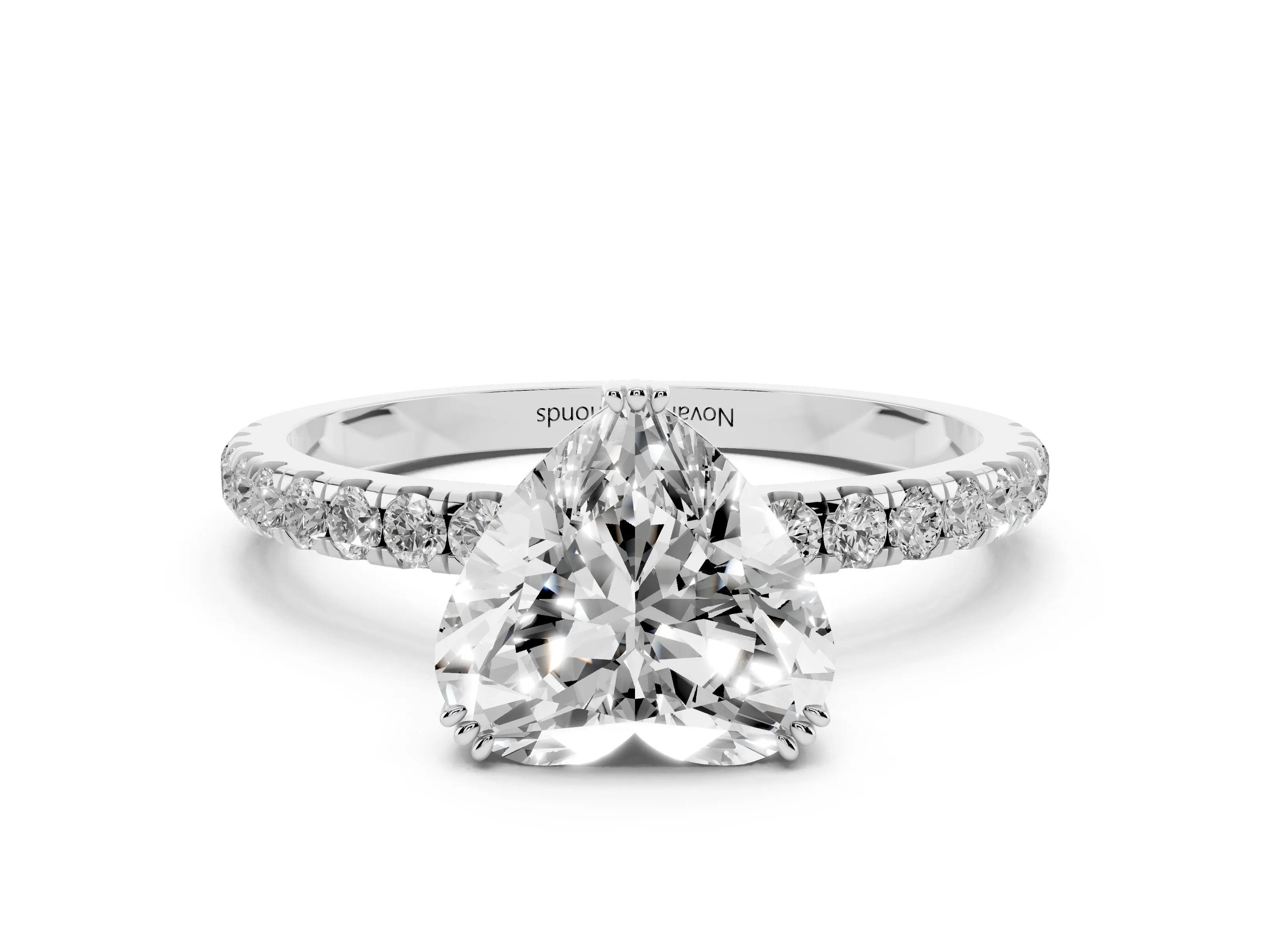 Heart Cut Diamond Brilliant Solitaire Set in White gold with Pavé Band and Claw Prong Setting