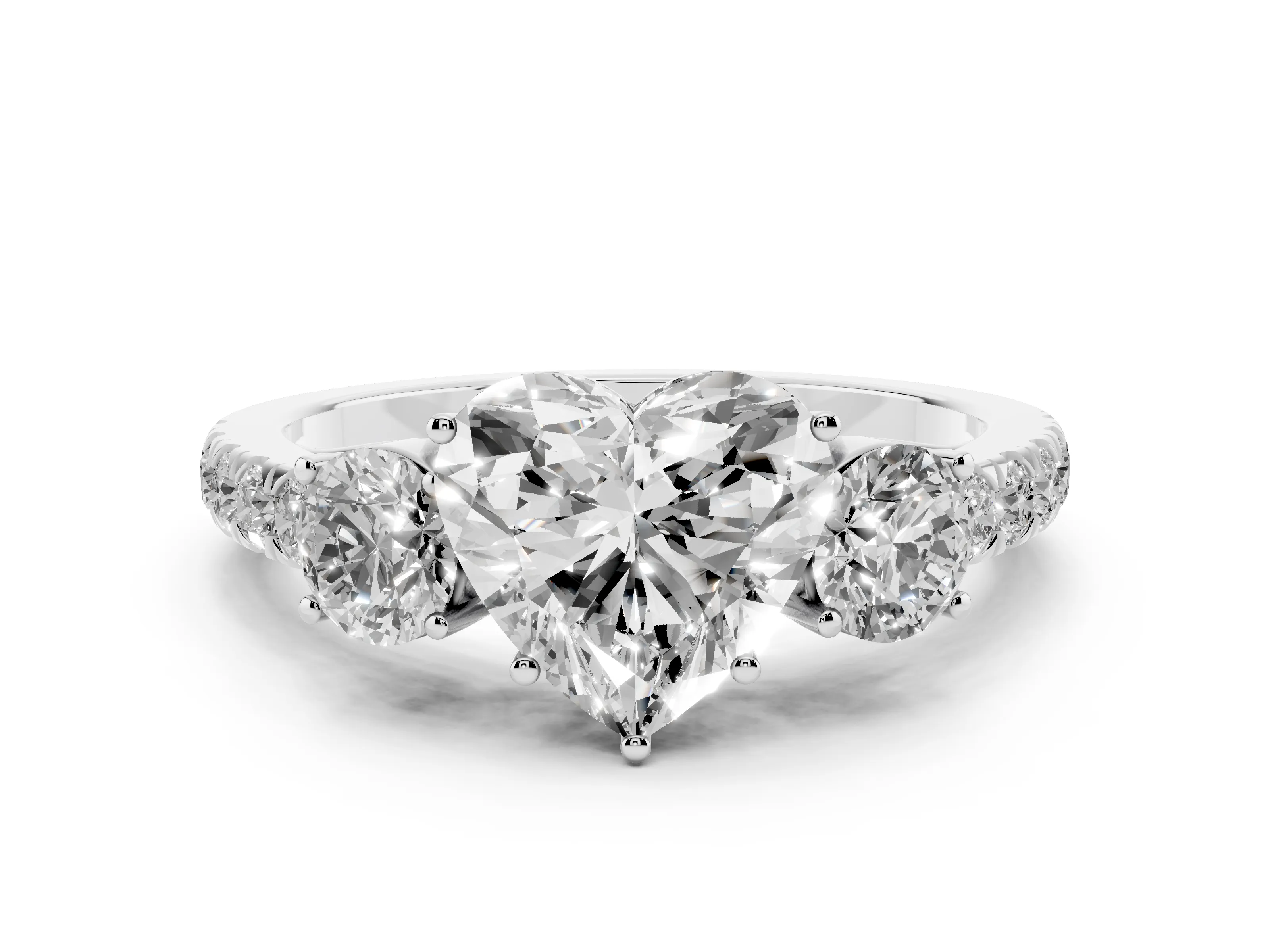 Heart Cut Diamond Three-Stone Ring Set in White gold with Round Side Stones and Delicate Pavé Band