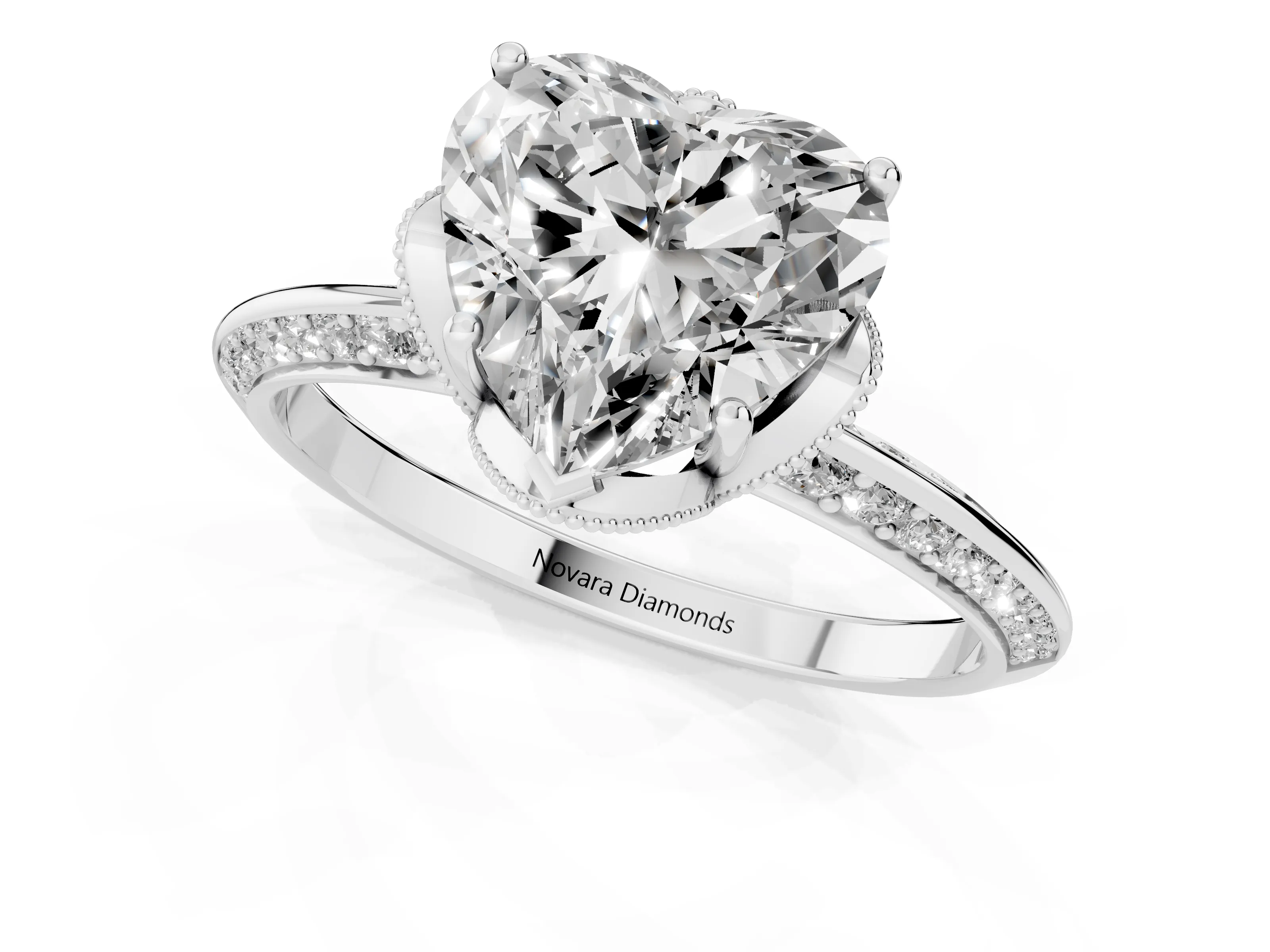Heart Cut Diamond Solitaire Engagement Ring Set in White gold with Pavé Split Shank and Prong Setting