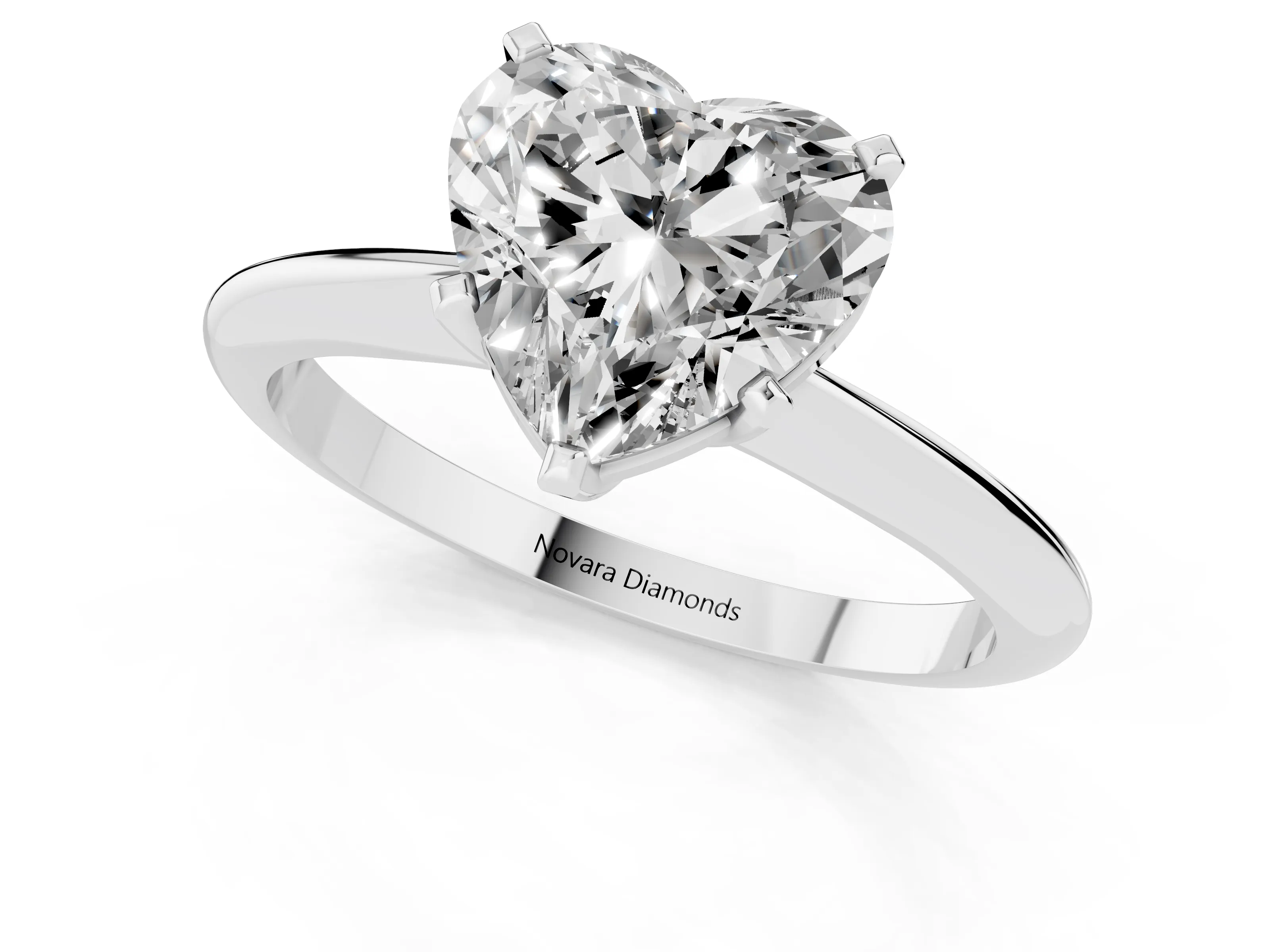 Heart Cut Diamond Solitaire Ring Set in Silver with Prong Setting on a Plain Round Band – second view