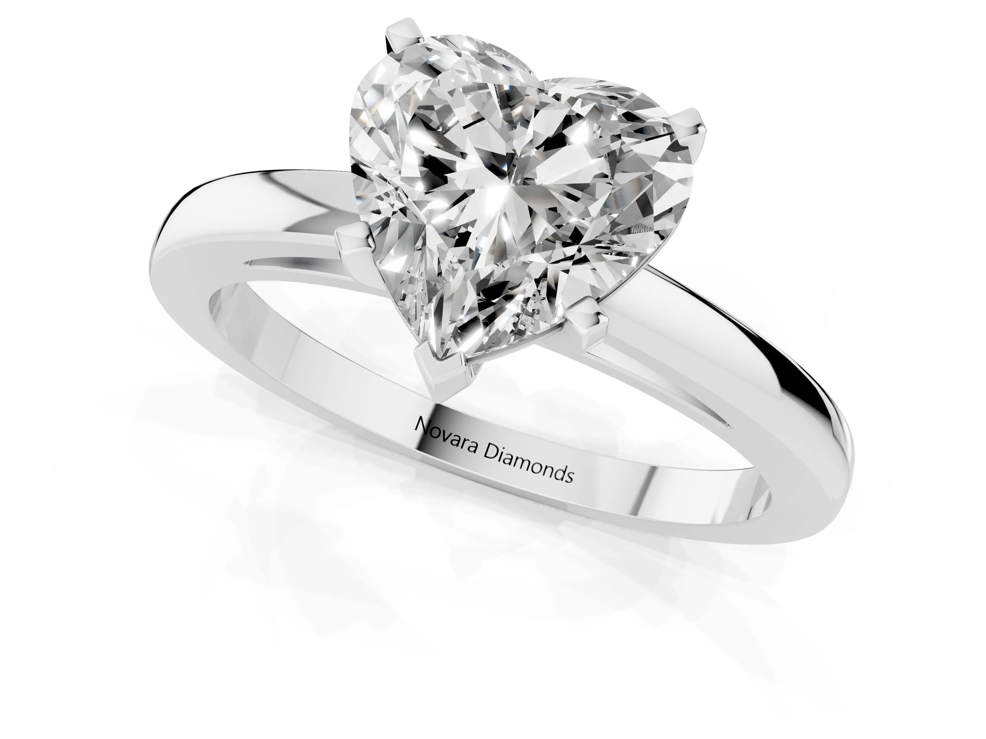 Heart Cut Diamond Solitaire Engagement Ring Set in Platinum with Prong Setting on a Classic Band