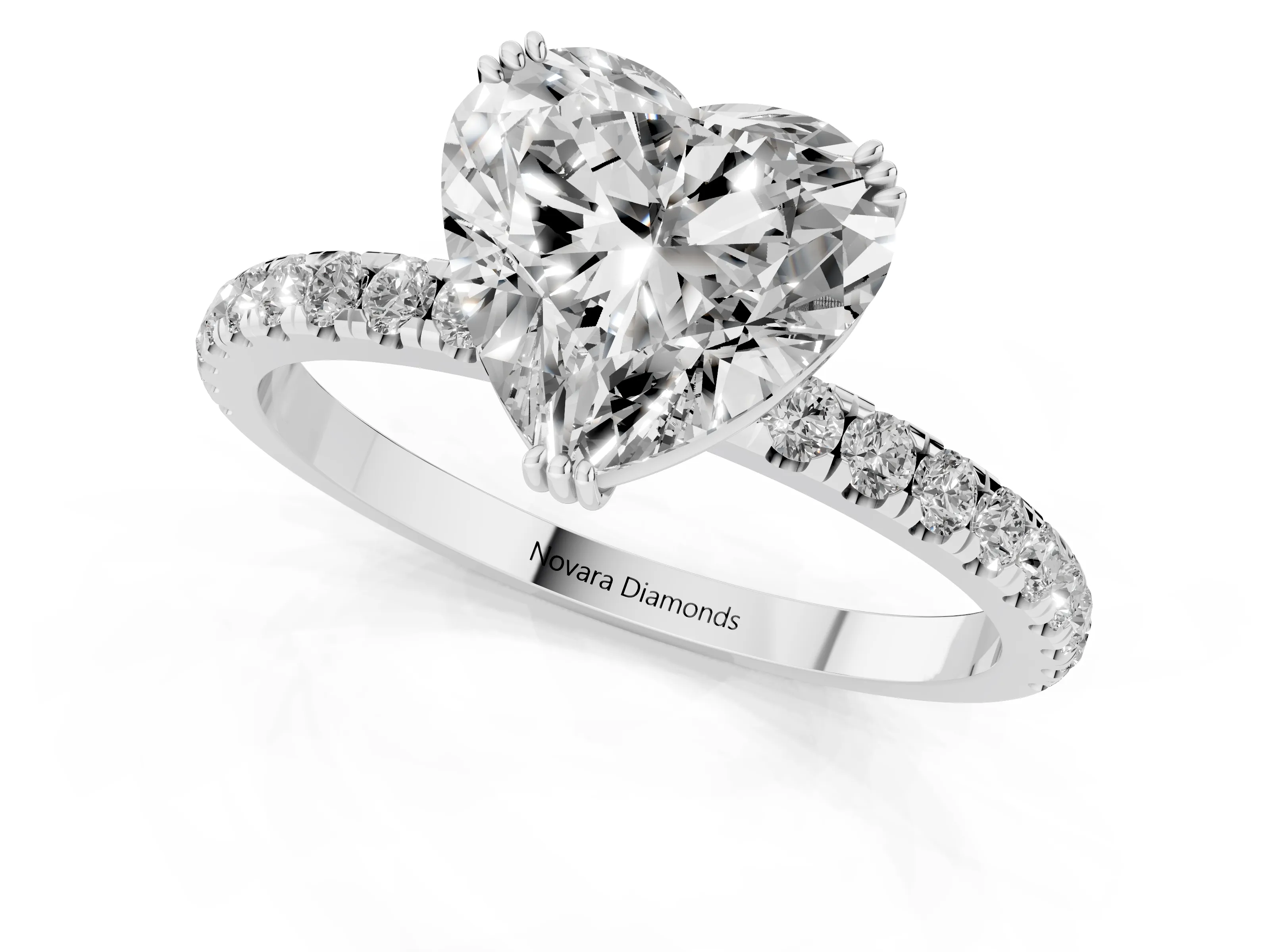 Heart Cut Diamond Brilliant Solitaire Set in White gold with Pavé Band and Claw Prong Setting