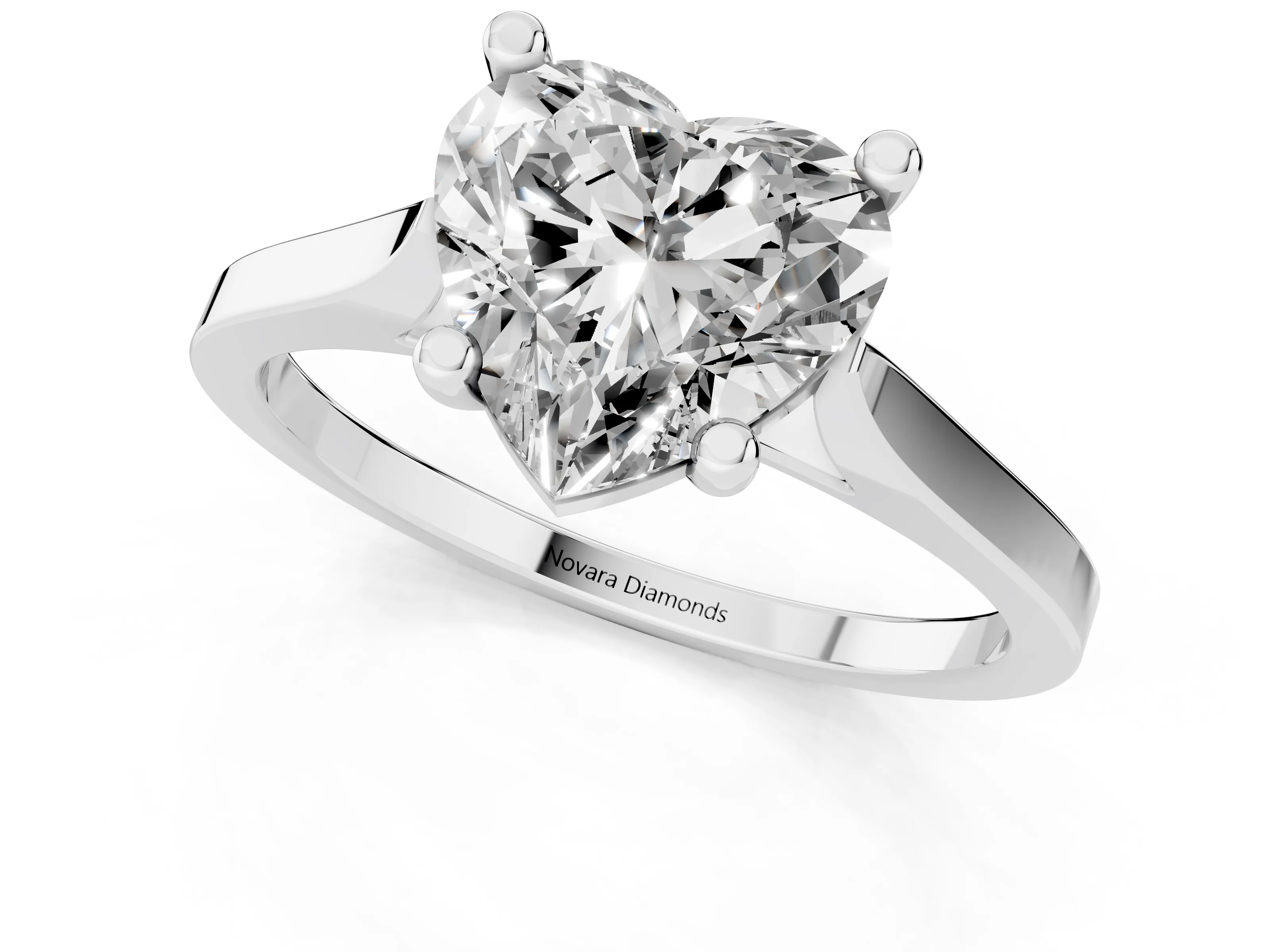 Heart Cut Diamond Solitaire Ring Set in White gold with Prong Setting and Tapered Band