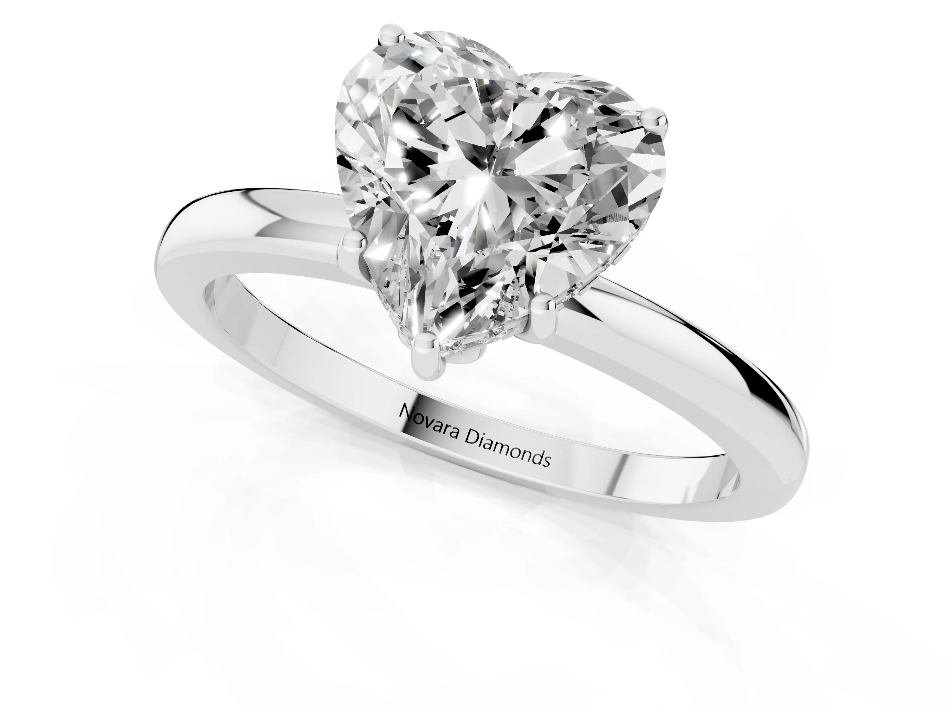 Heart Cut Diamond Solitaire Ring Set in Platinum with Plain Band and Prong Setting