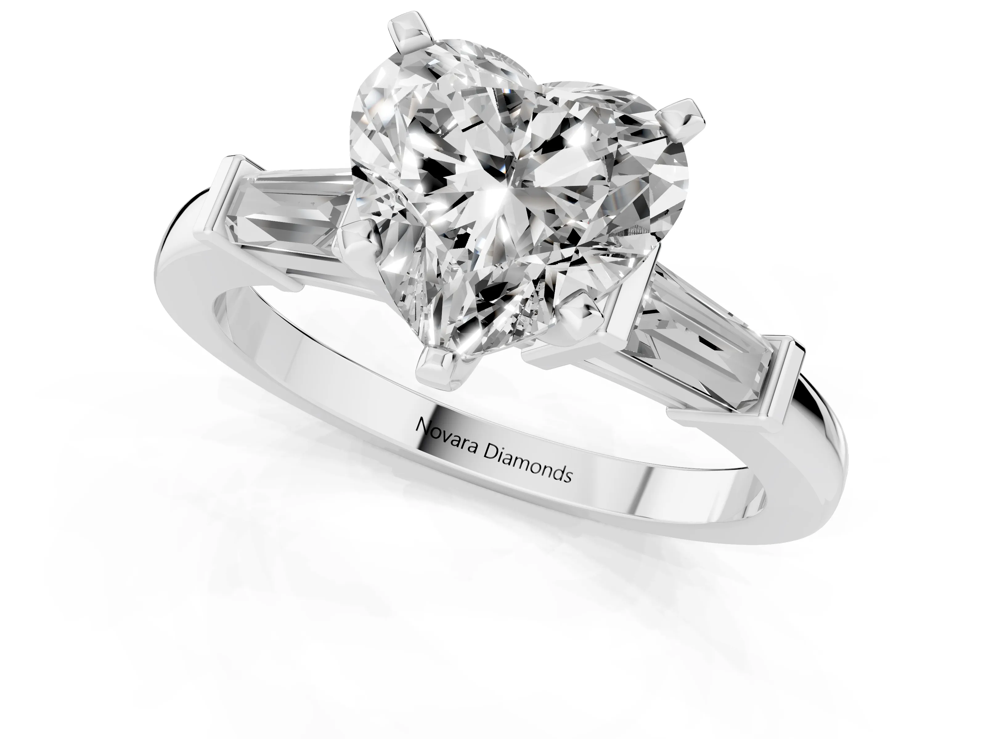 Heart Cut Diamond Solitaire Ring Set in White gold with Tapered Baguette Accents and Prong Setting