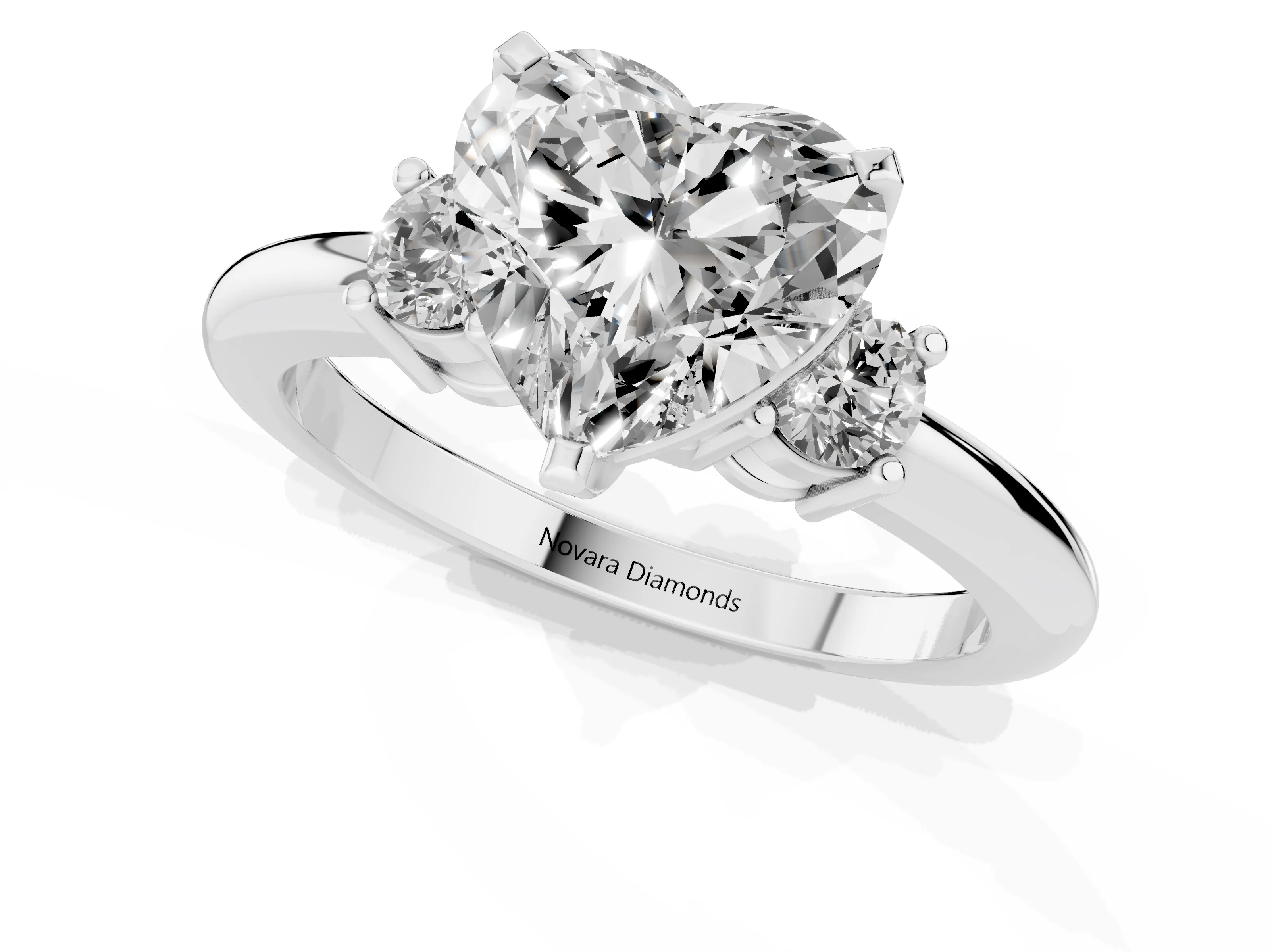 Three-Stone Heart Cut Diamond Ring Set in Silver with Prong Setting and Plain Band