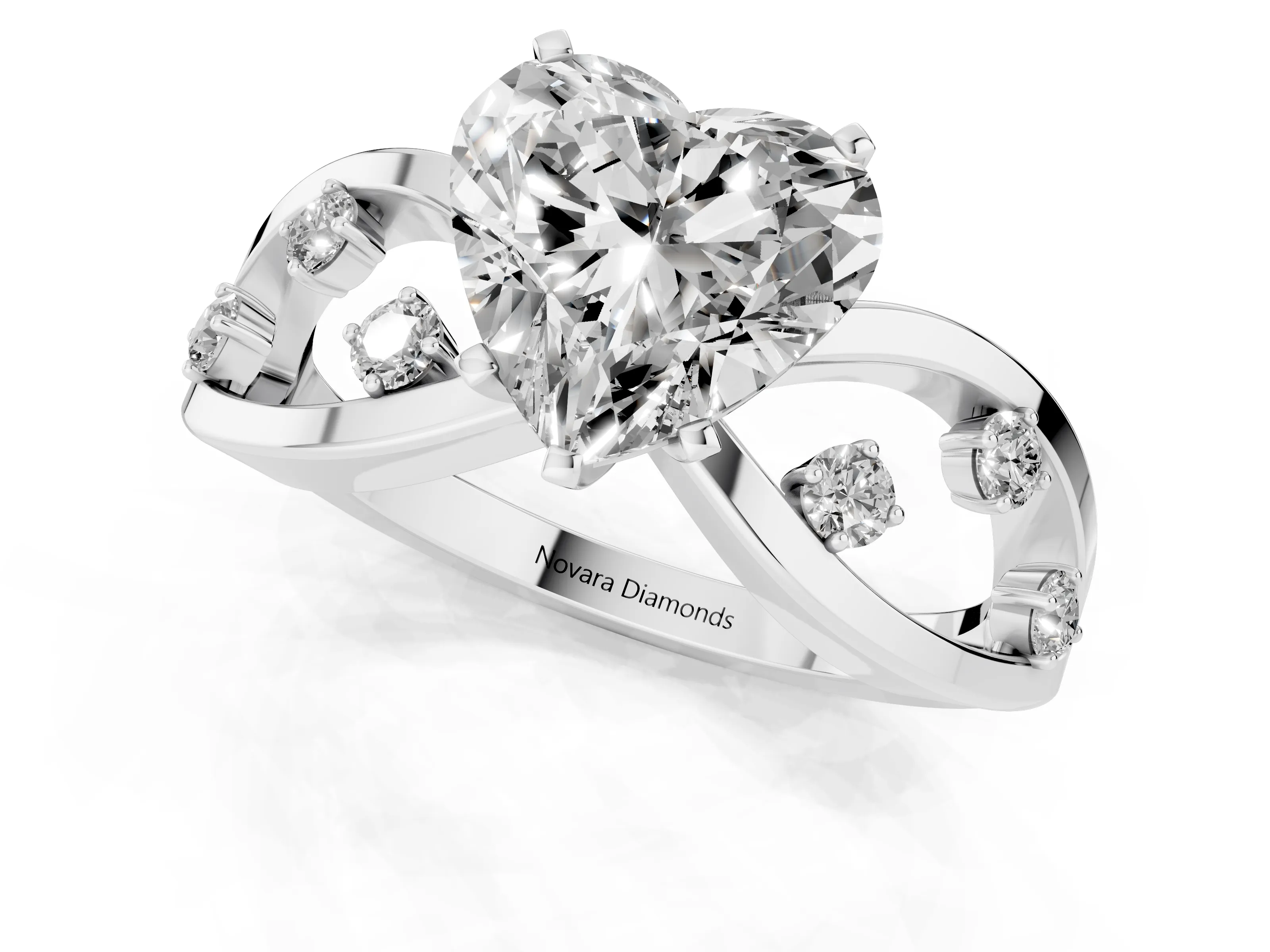 Heart Cut Diamond Solitaire Ring Set in Platinum with Side Stones on Criss-Cross Band and Prong Setting