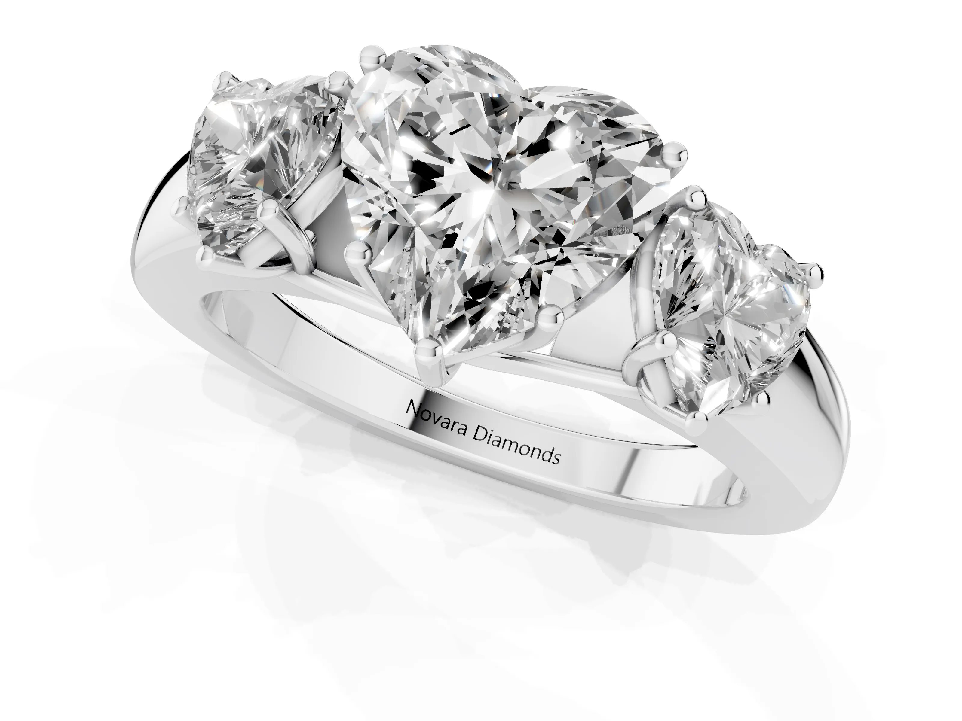 Three-Stone Heart Cut Diamond Ring Set in Platinum with Matching Prong Settings and Plain Band – second view