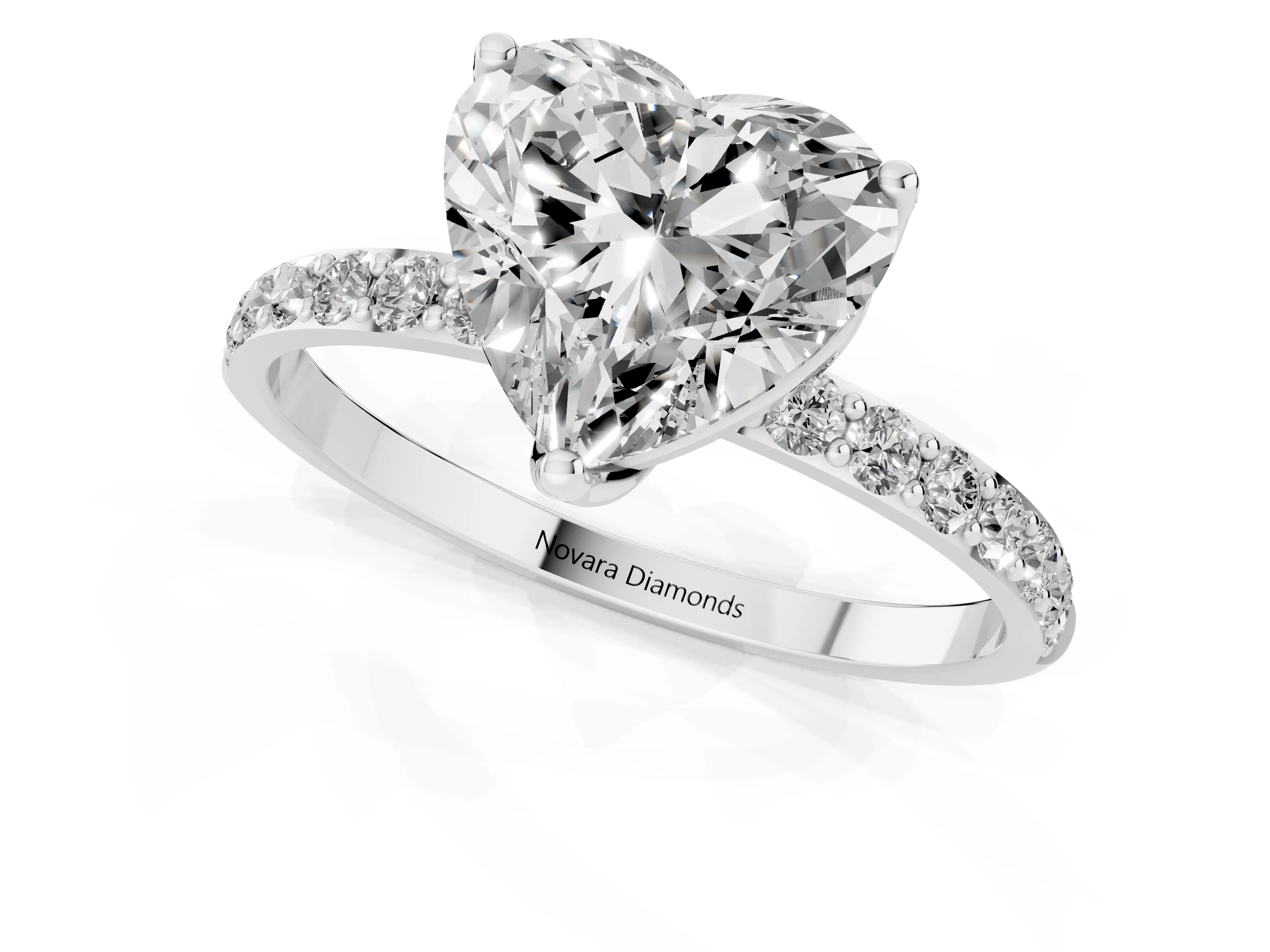 Heart Cut Diamond Solitaire Engagement Ring Set in White gold with Round Pavé Band and Prong Setting