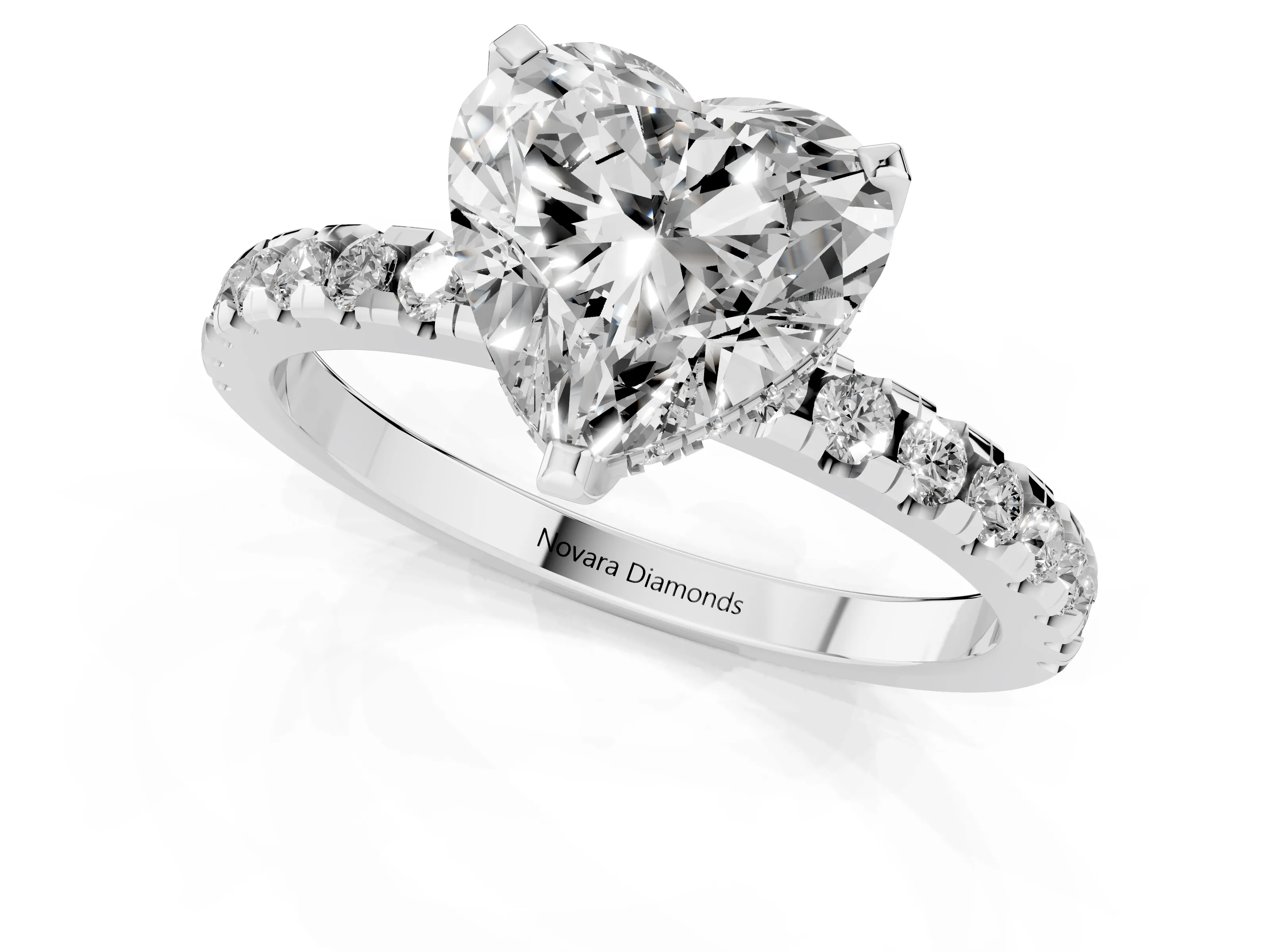 Heart Cut Diamond Pavé Solitaire Ring Set in White gold with Round Band Accents and Prong Setting