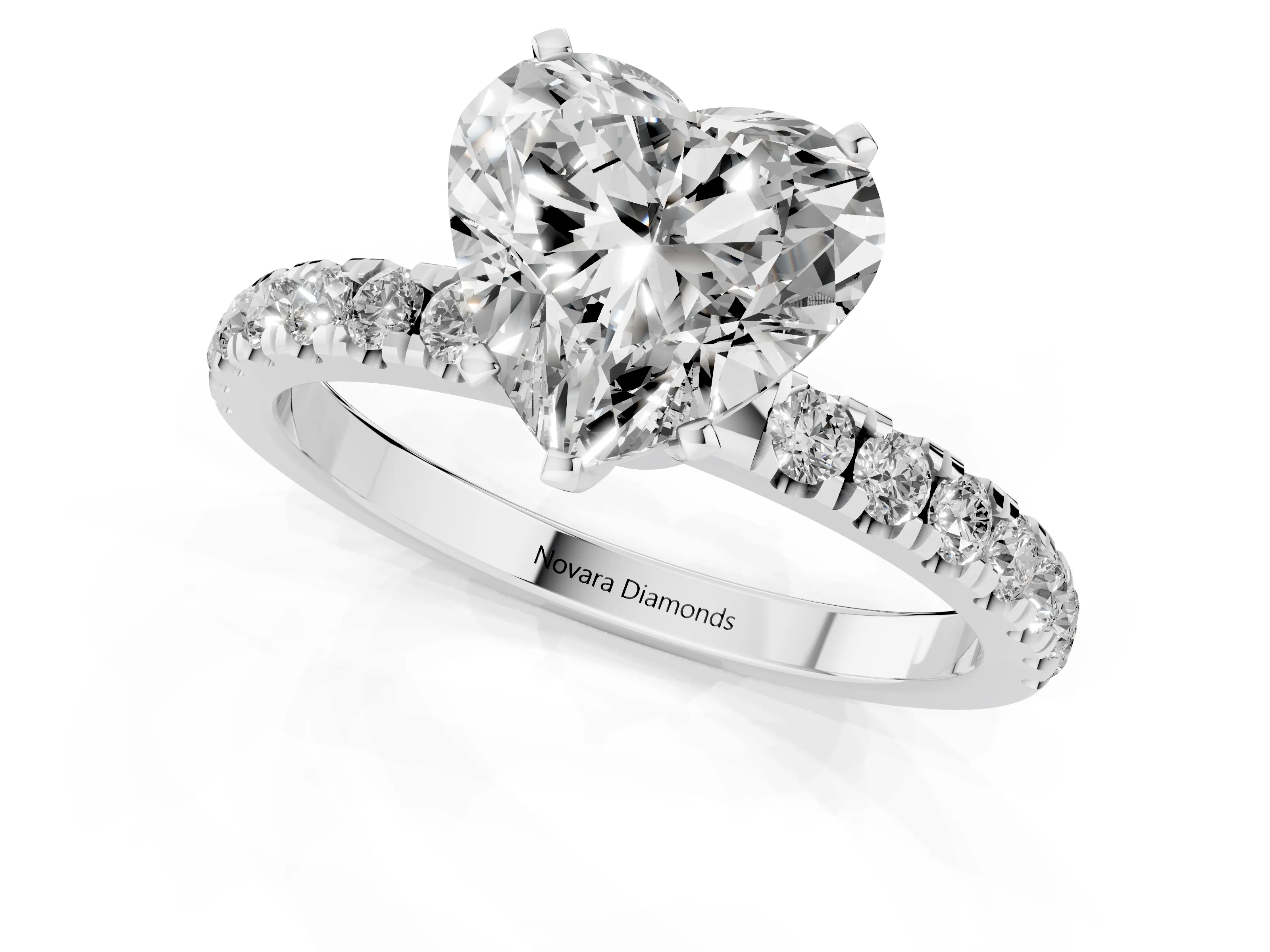 Heart Cut Diamond Solitaire Ring Set in Platinum with Pavé Accents and Prong Setting