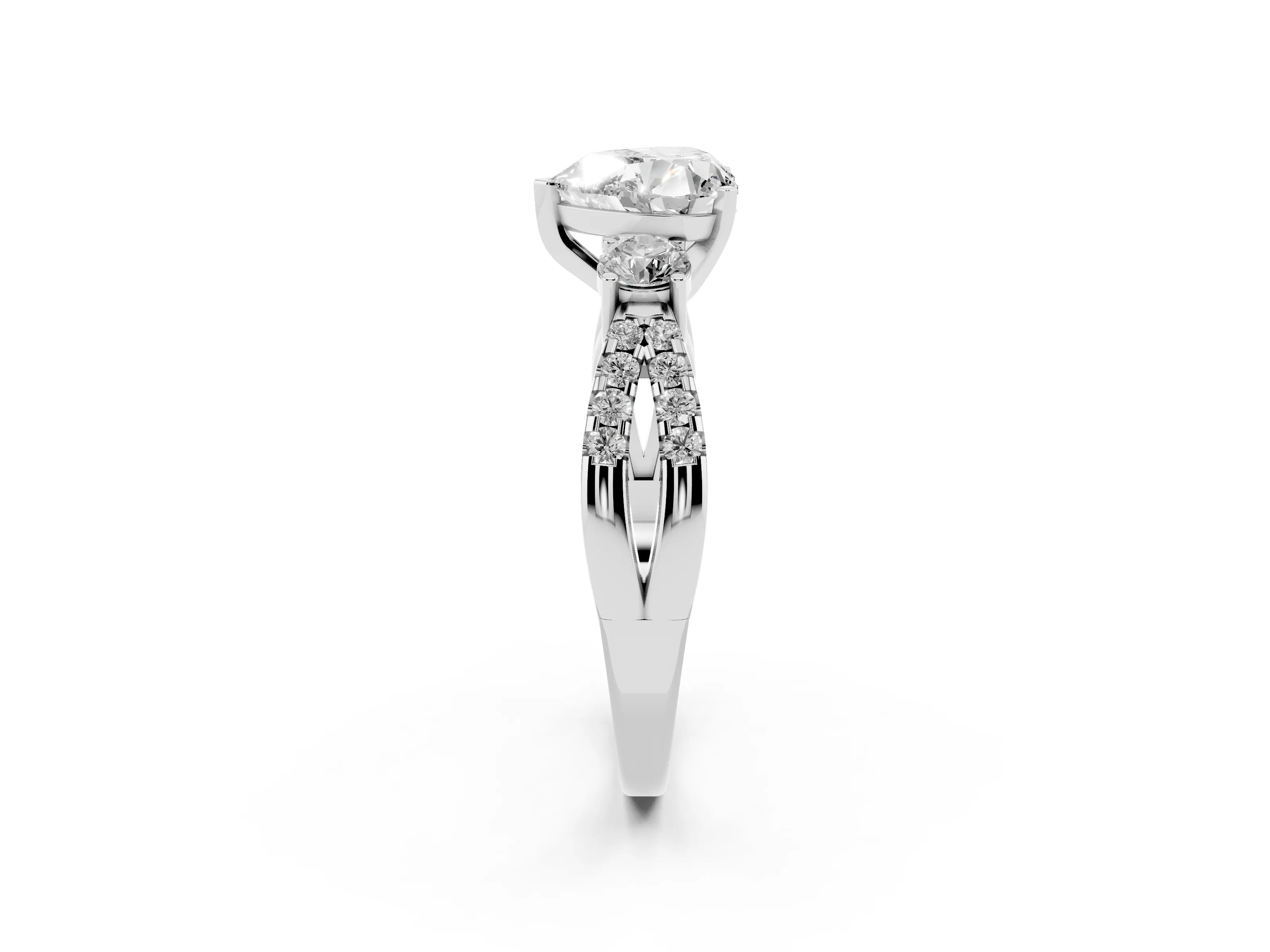 Heart Cut Diamond Three-Stone Ring Set in Platinum with Pavé Split Shank and Prong Setting