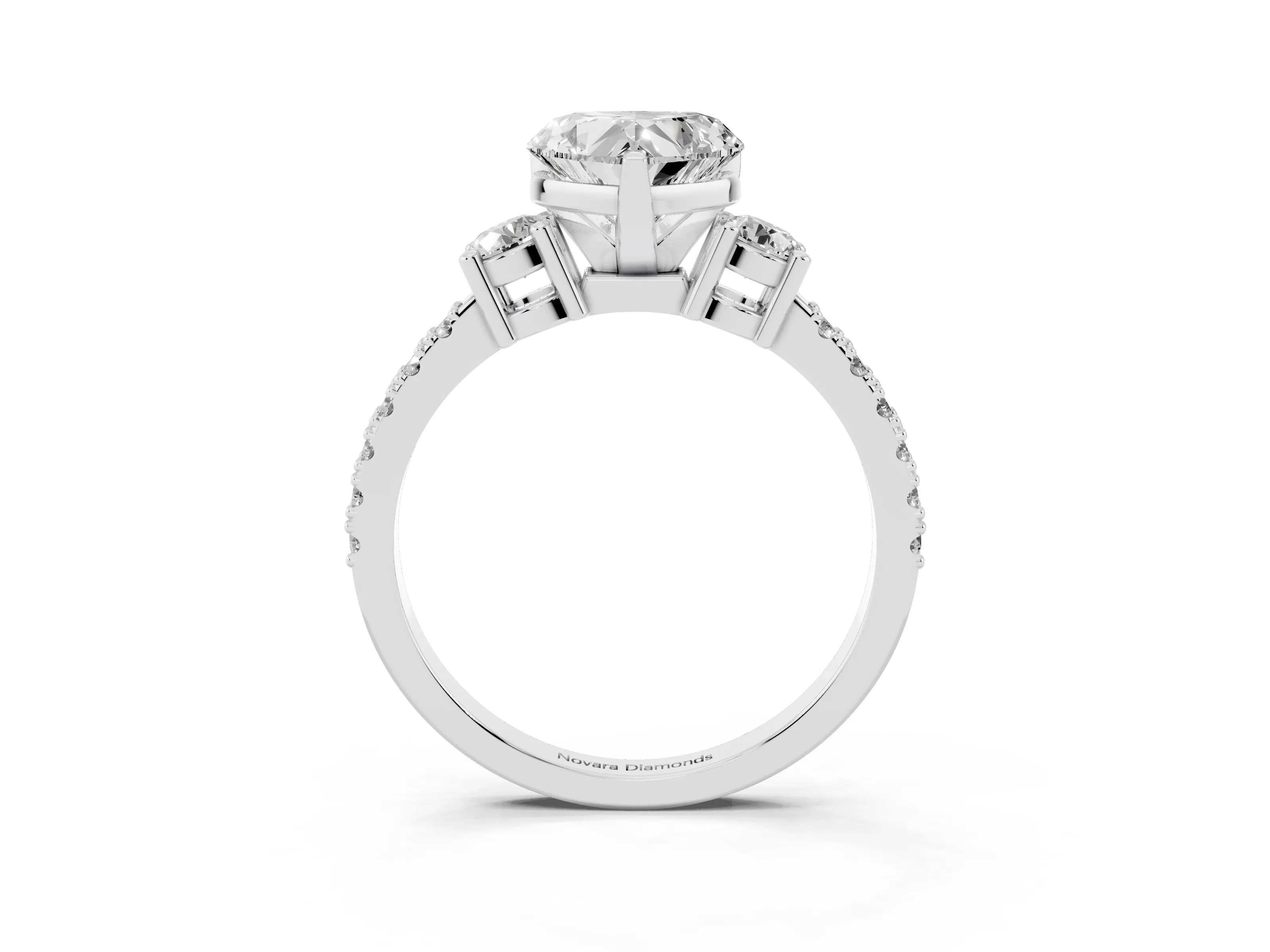 Three-Stone Heart Cut Diamond Pavé Band Ring Set in Platinum with Prong Setting