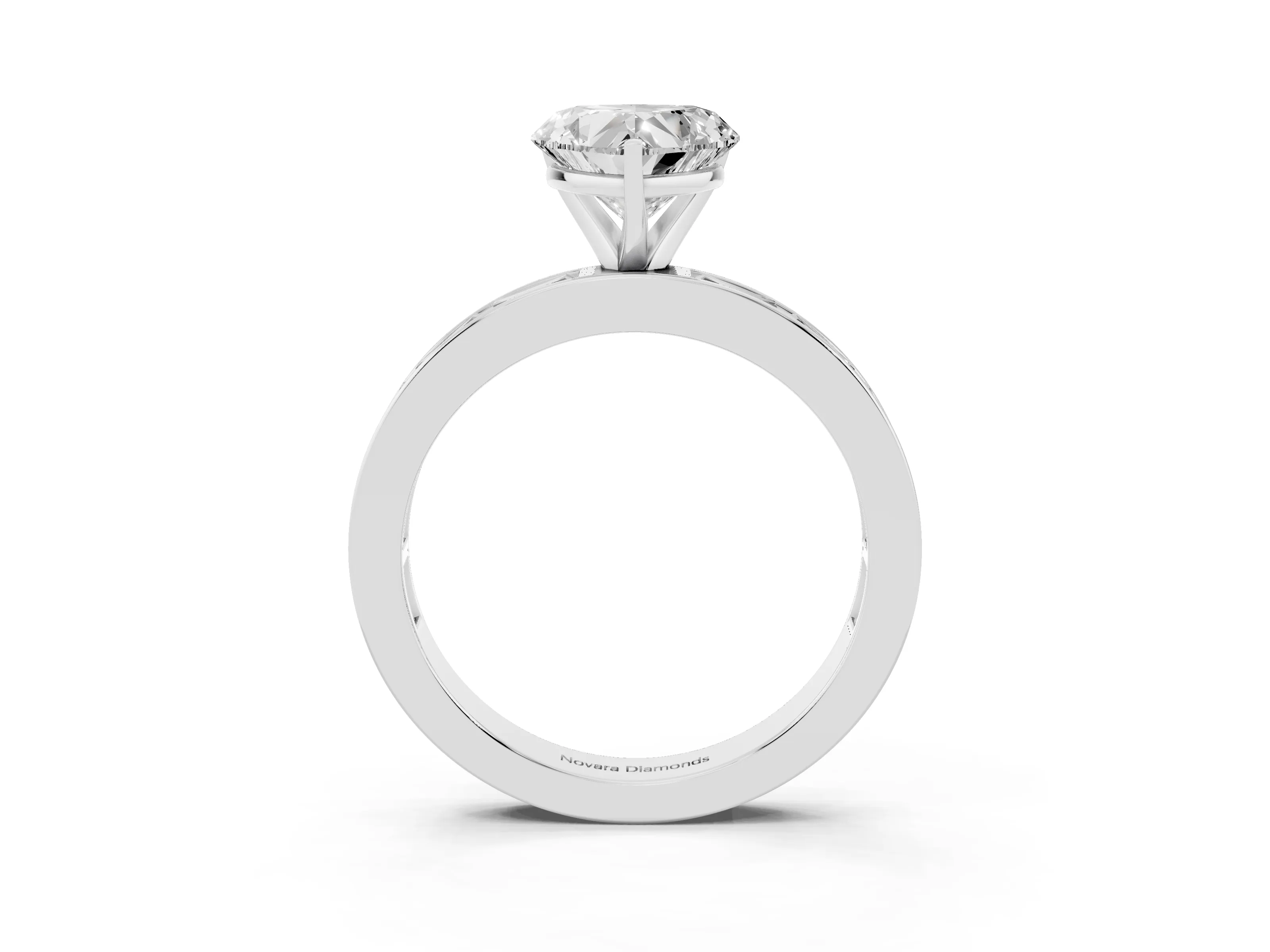 Heart Cut Diamond Solitaire Ring Set in White gold with Channel-Set Baguette Band and Prong Setting