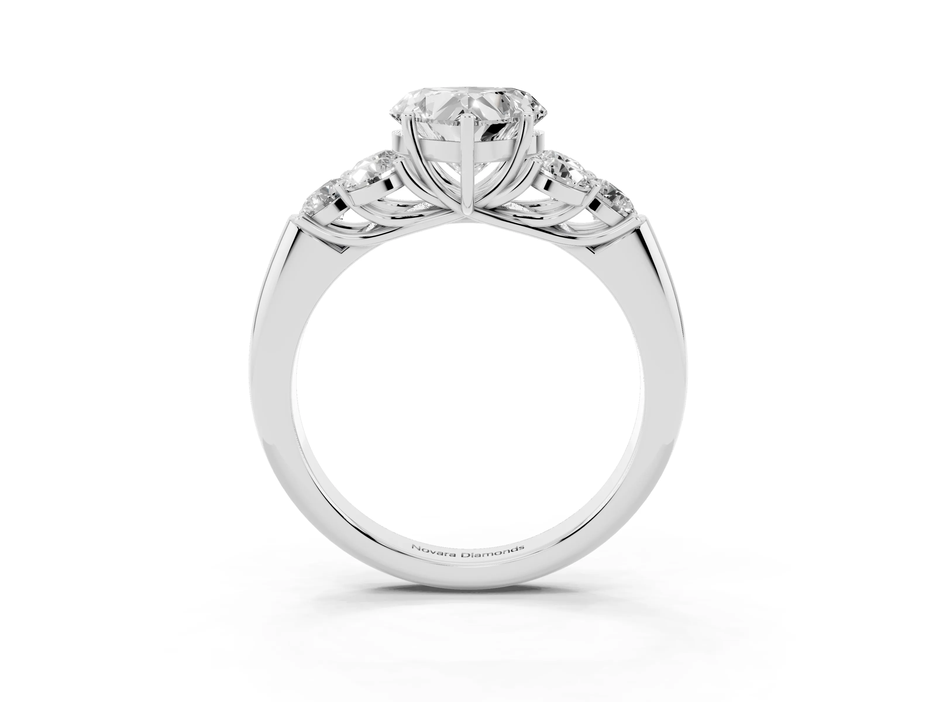 Heart Cut Diamond Cluster Ring Set in Silver with Round Accent Stones and Prong Setting on a Plain Band