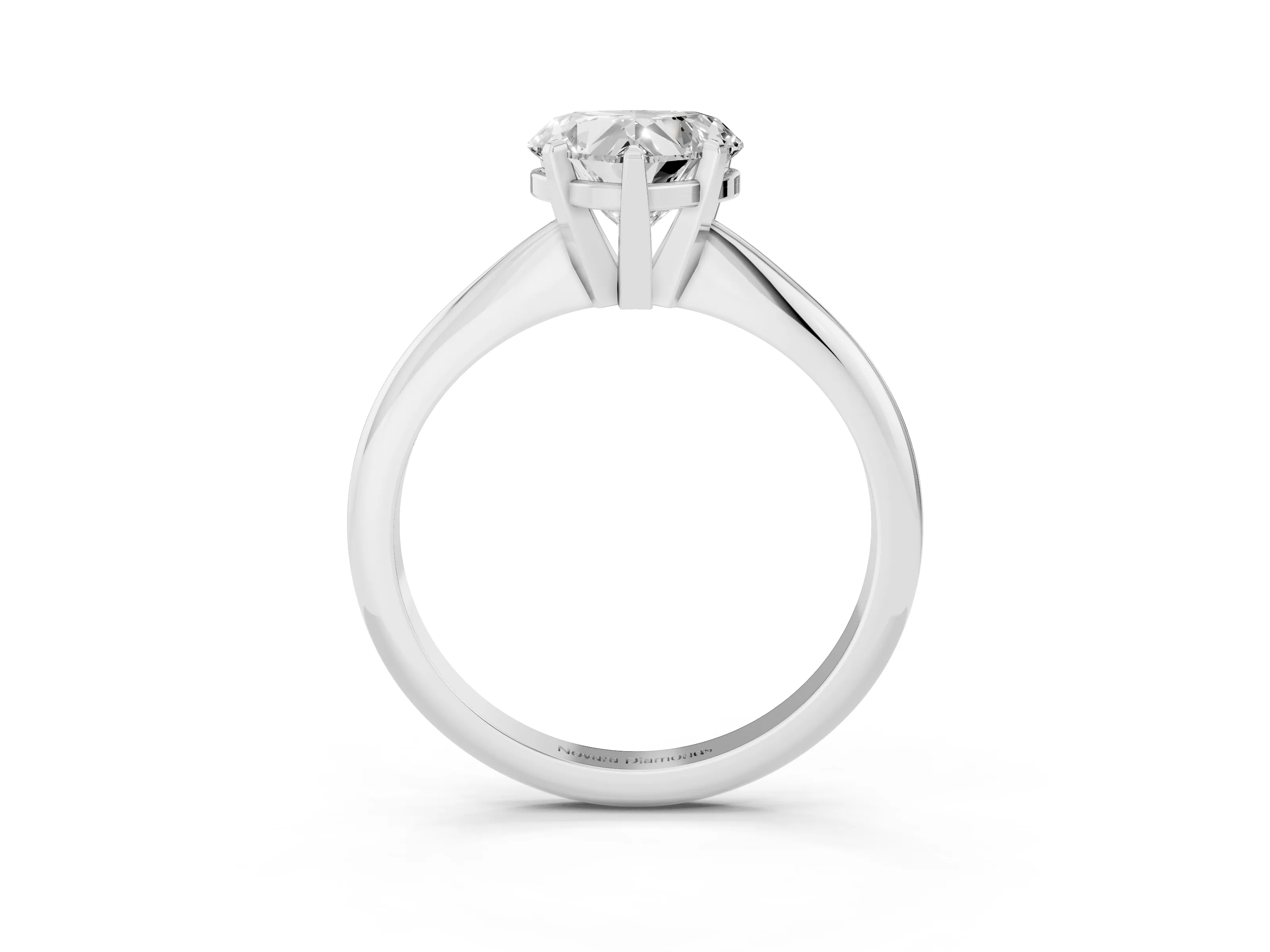 Heart Cut Diamond Solitaire Ring Set in Silver with Prong Setting on a Plain Round Band