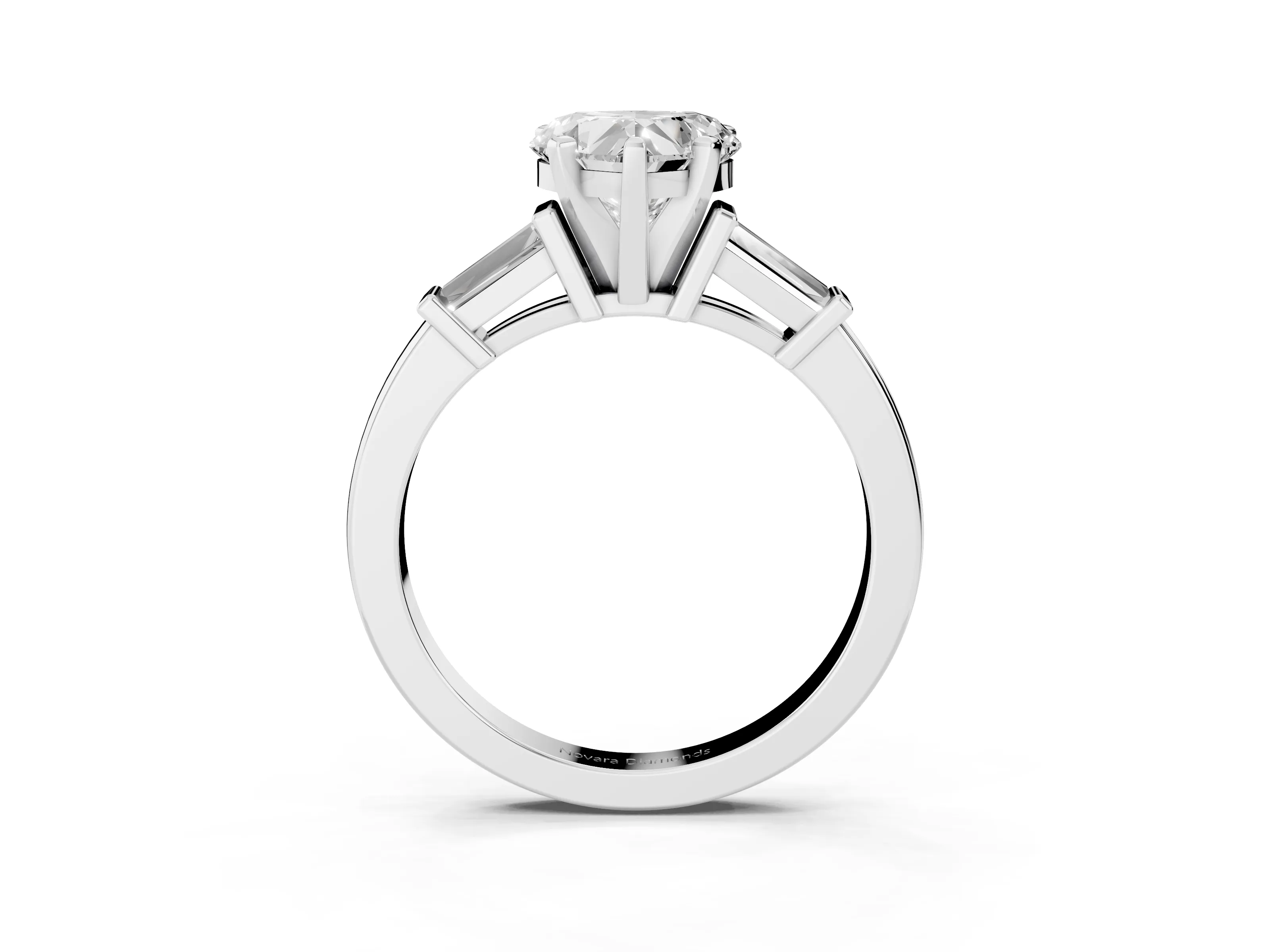 Heart Cut Diamond Solitaire Ring Set in White gold with Tapered Baguette Accents and Prong Setting