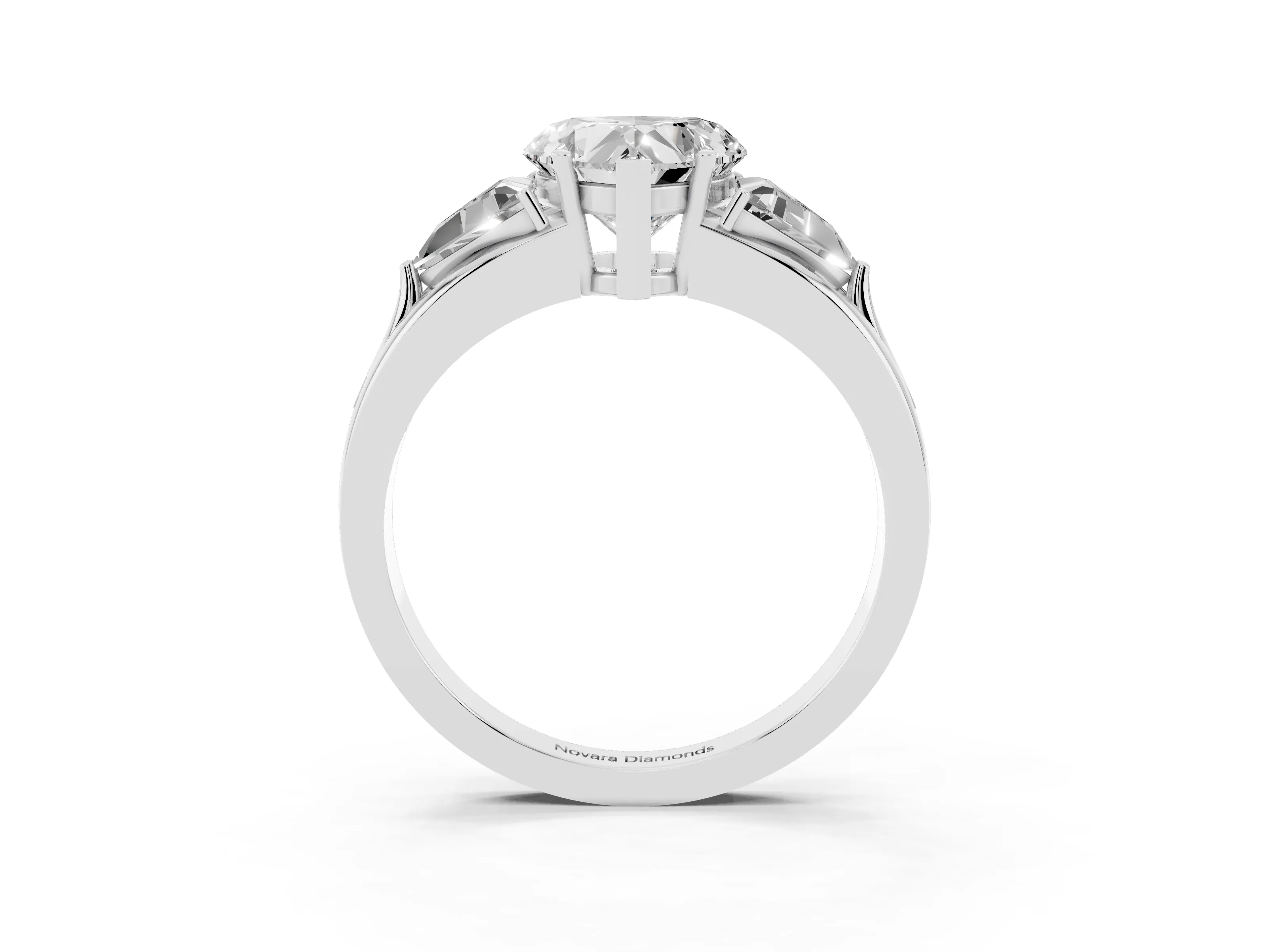 Heart Cut Diamond Three-Stone Ring Set in White gold with Trillion Side Stones and Split Shank