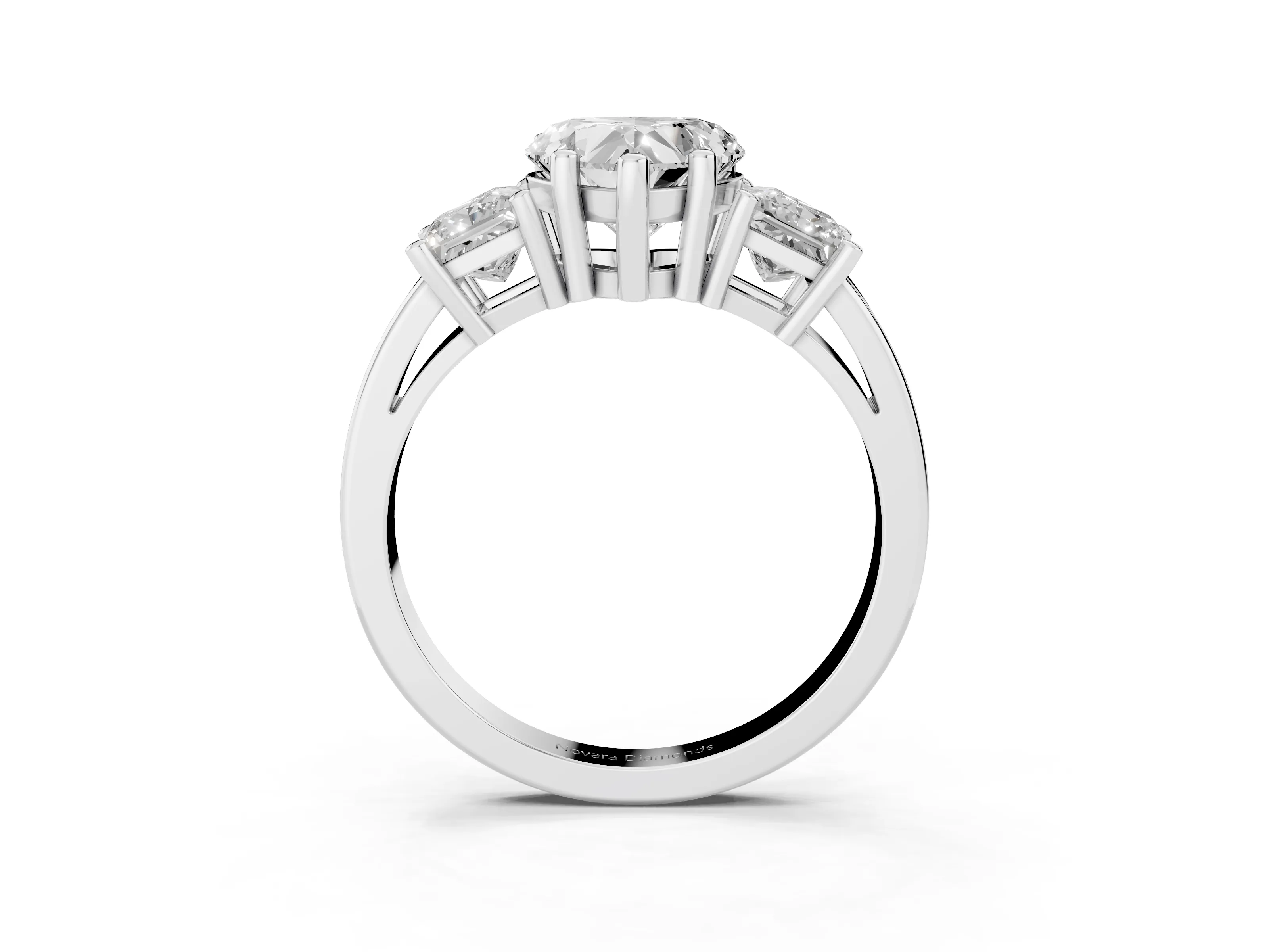 Three-Stone Heart Cut Diamond Solitaire Ring Set in Platinum with Prong Setting