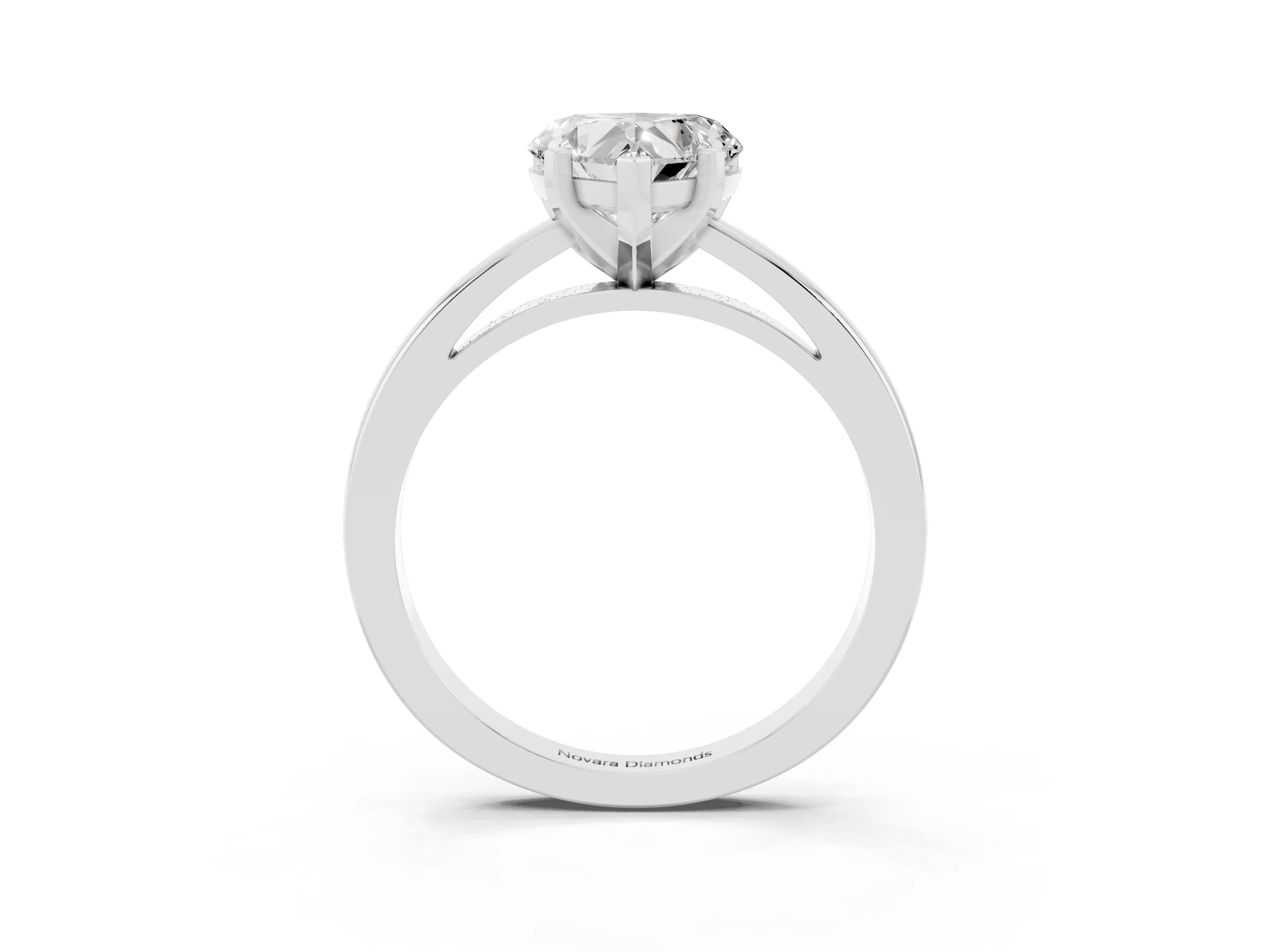 Heart Cut Diamond Solitaire Engagement Ring Set in Platinum with Prong Setting on a Classic Band
